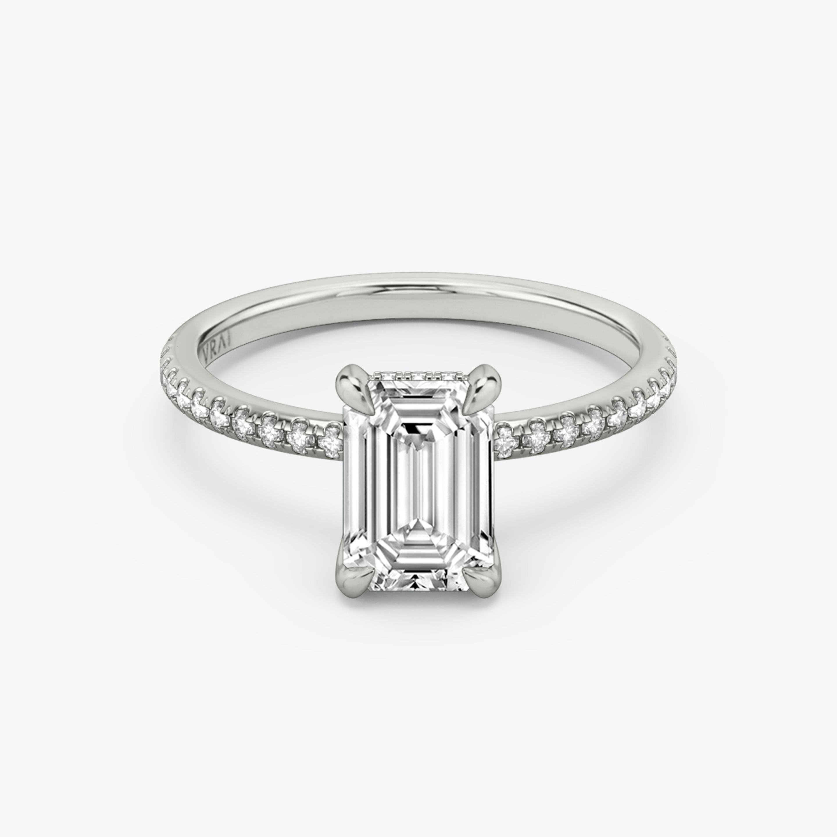 The Classic Hidden Halo | Emerald | Platinum | Band: Pavé | Prong style: Plain | Diamond orientation: vertical | Carat weight: See full inventory
