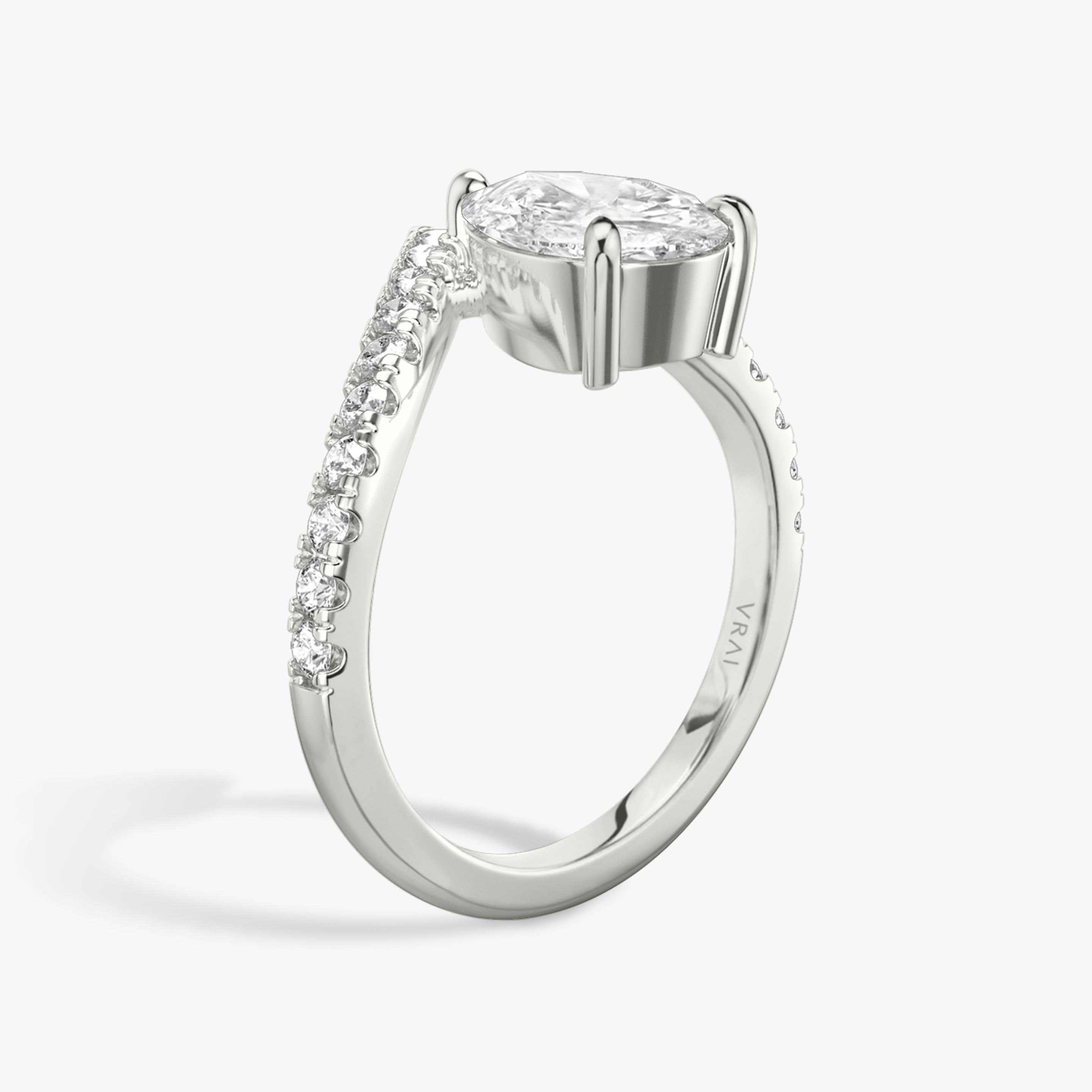 The Signature V | Pear | Platinum | Band: Pavé | Diamond orientation: vertical | Carat weight: See full inventory