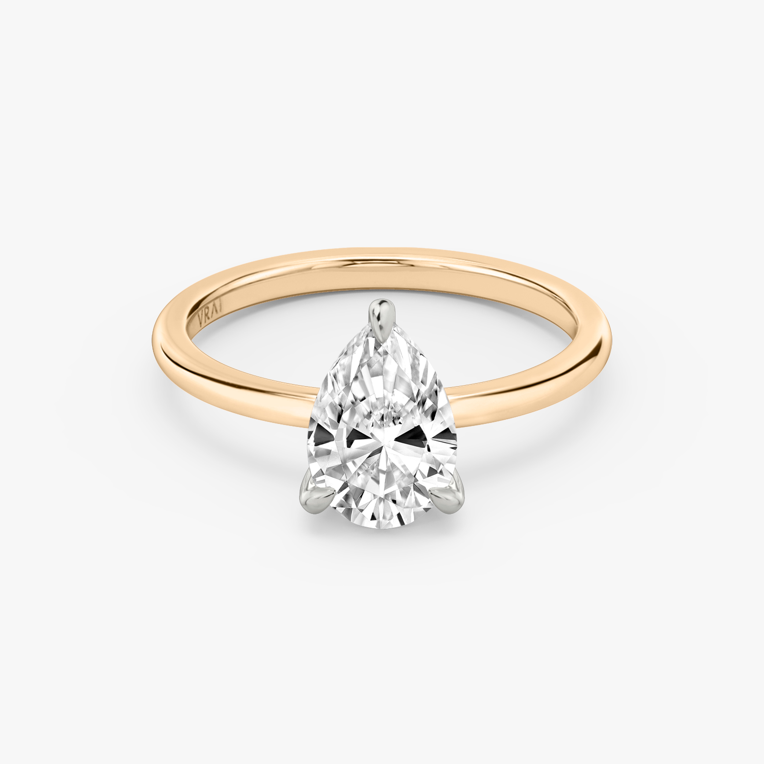 Two tone pear deals shaped engagement ring