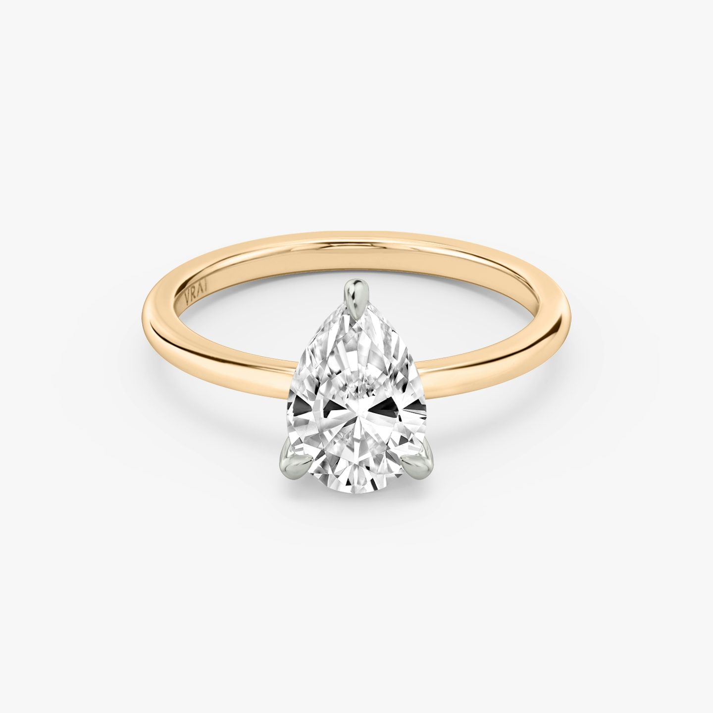 The Classic Two Tone | Pear | 14k | 14k Rose Gold and Platinum | Band: Plain | Diamond orientation: vertical | Carat weight: See full inventory