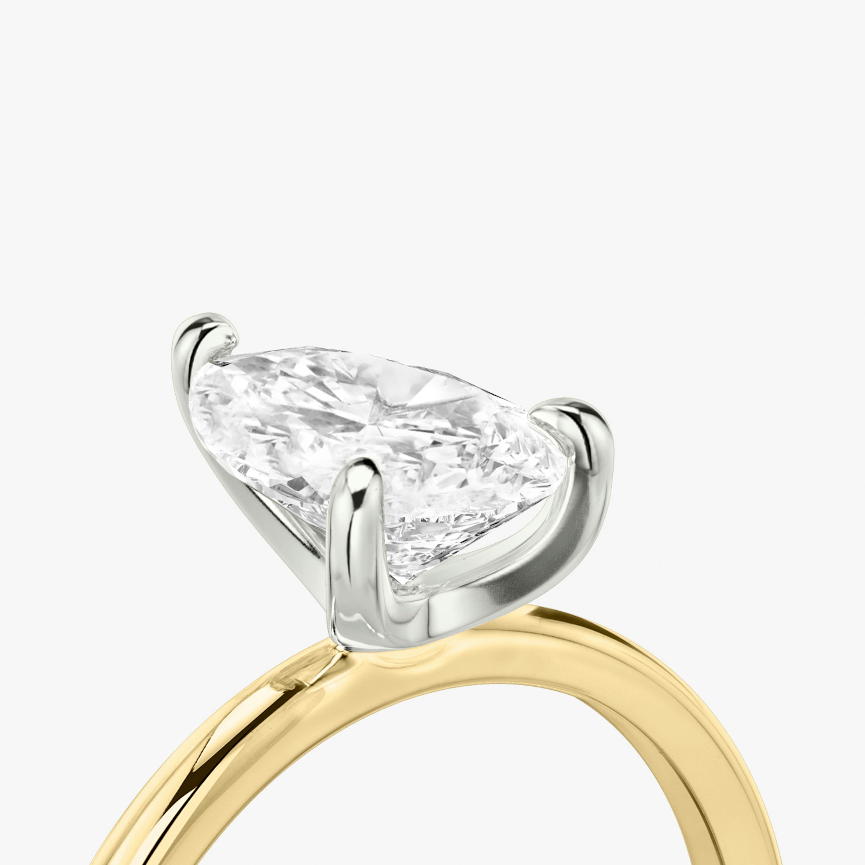 The Classic Two Tone | Pear | 18k | 18k Yellow Gold and Platinum | Band: Plain | Diamond orientation: vertical | Carat weight: See full inventory