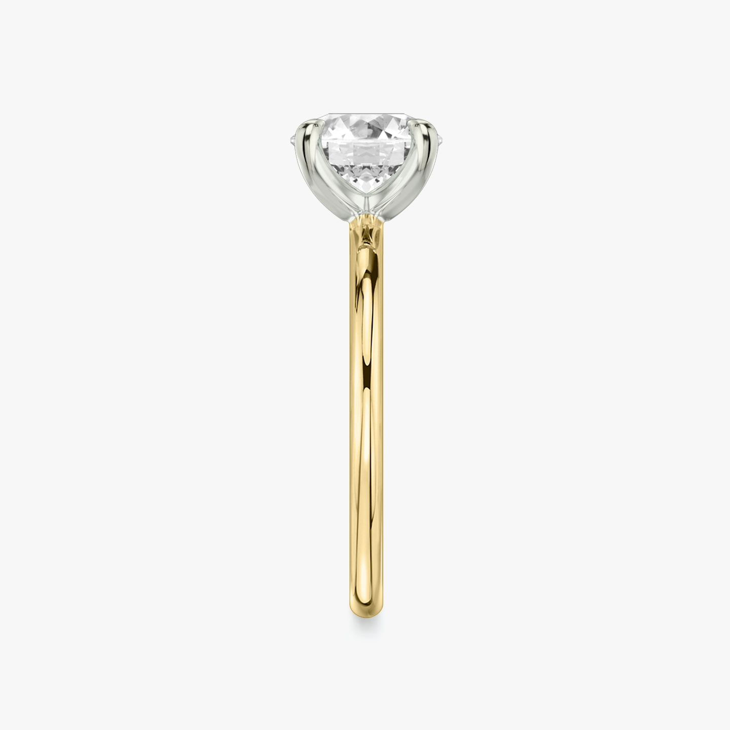 The Classic Two Tone | Round Brilliant | 18k | 18k Yellow Gold and Platinum | Band: Plain | Carat weight: See full inventory | Diamond orientation: vertical