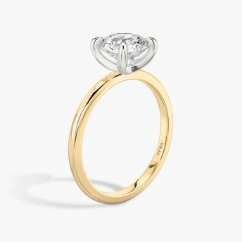 Two tone round brilliant engagement ring