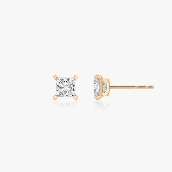 Two studs with a princess cut diamond in rose gold side view