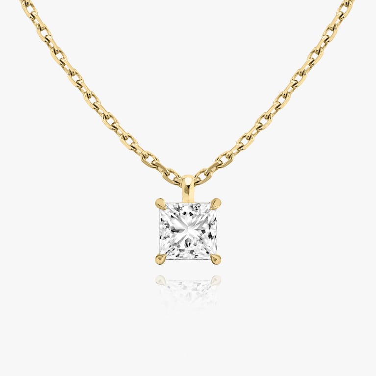Princess cut diamond pendant in yellow gold front view