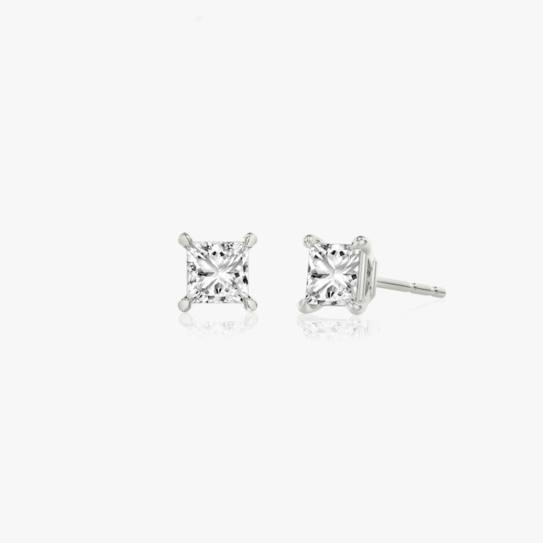 Two studs with a princess cut diamond in white gold front view