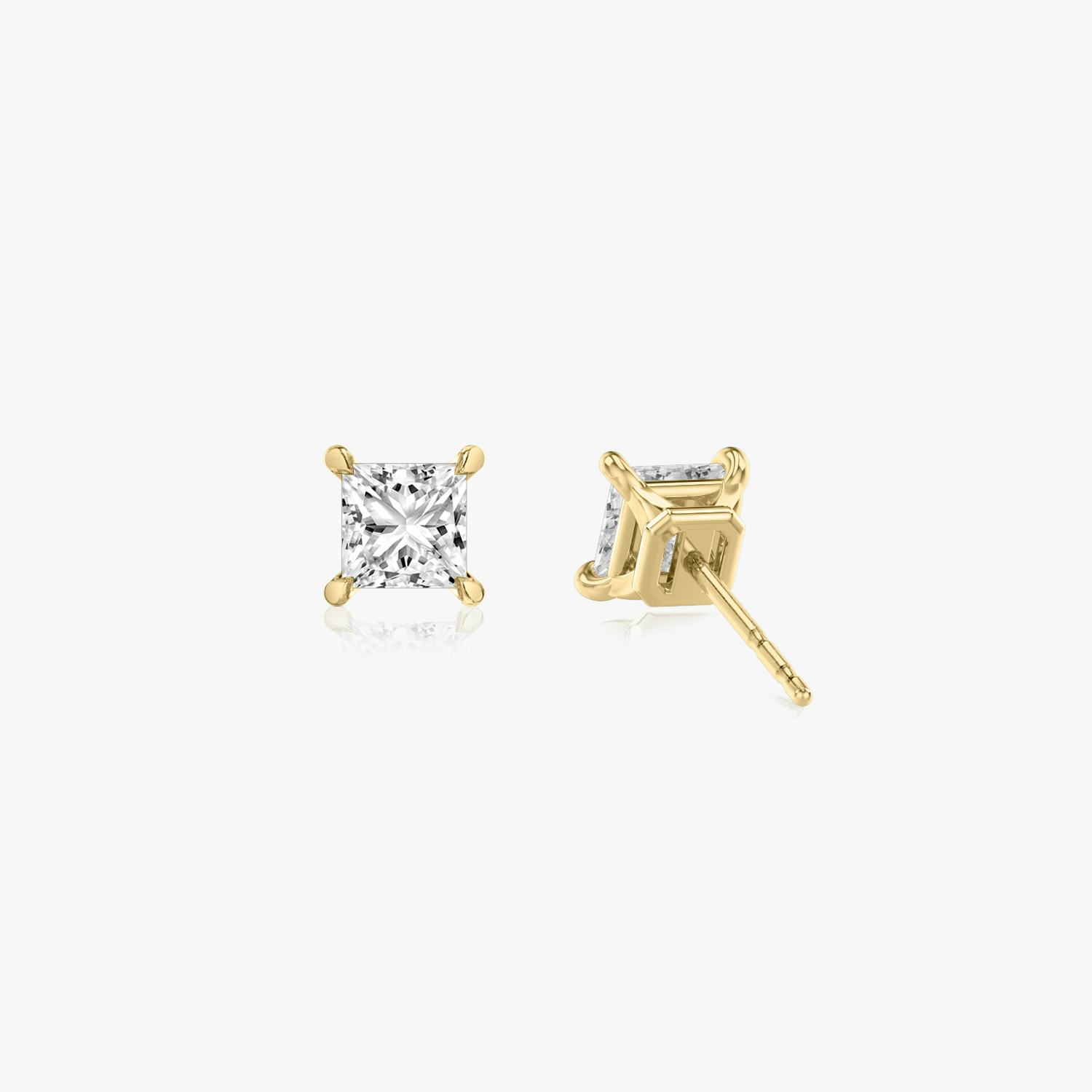 Two studs with a princess cut diamond in yellow gold back view