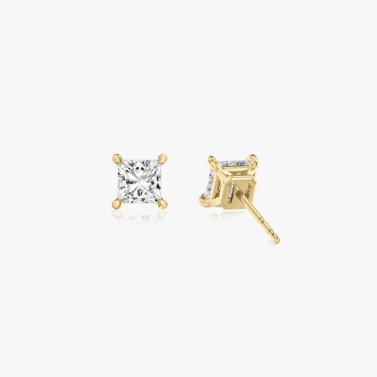 Two studs with a princess cut diamond in yellow gold back view