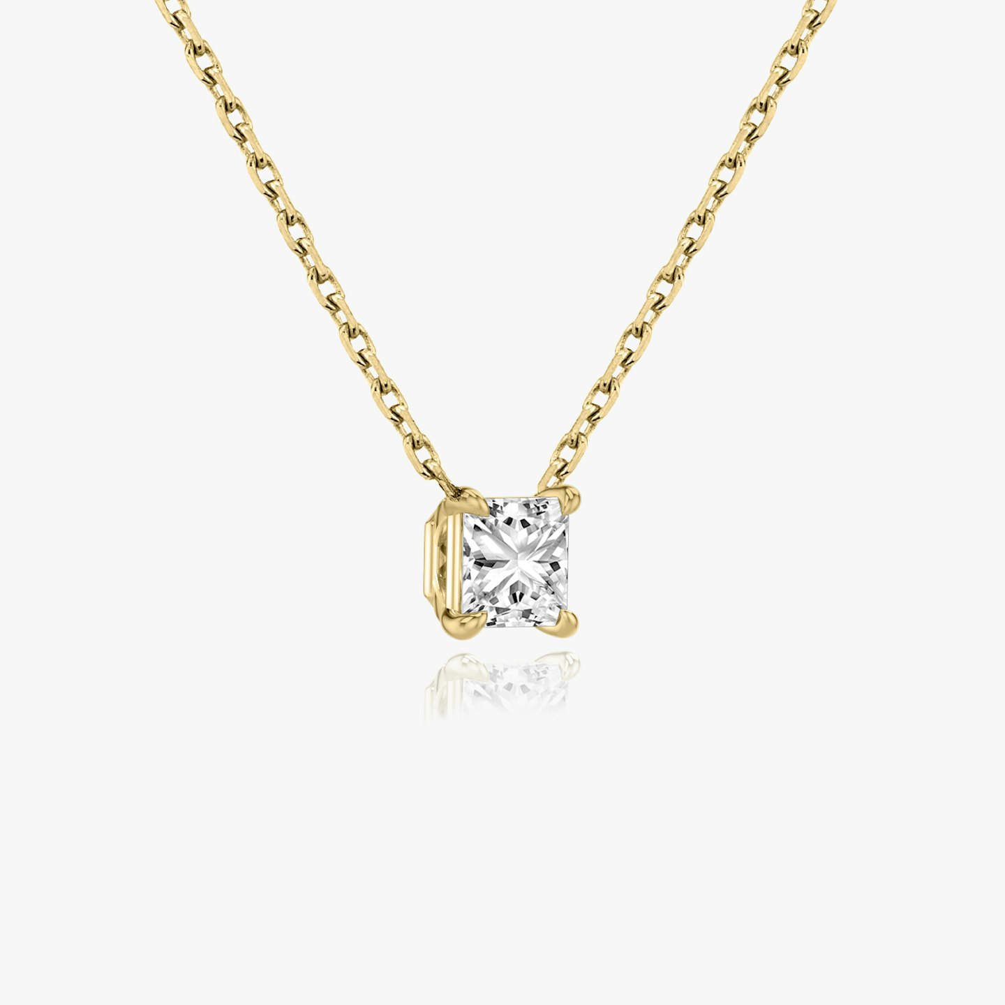 Solitaire Diamond Necklace Princess cut diamond necklace in yellow gold side view
