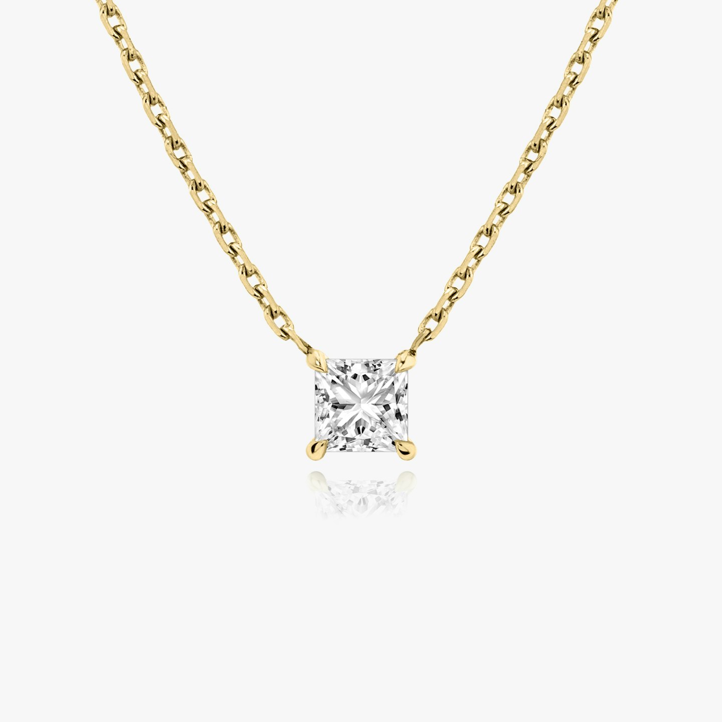 Princess cut diamond necklace in yellow gold front view