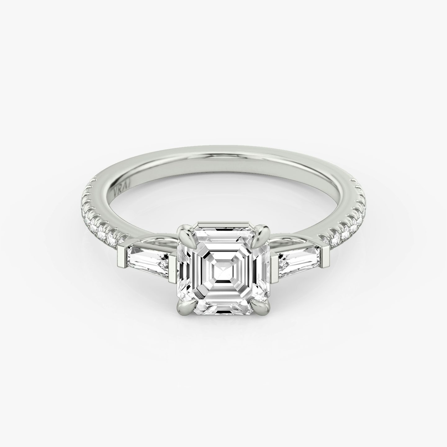 The Three Stone | Asscher | Platinum | Band: Pavé | Side stone carat: 1/10 | Side stone shape: Tapered Baguette | Diamond orientation: vertical | Carat weight: See full inventory