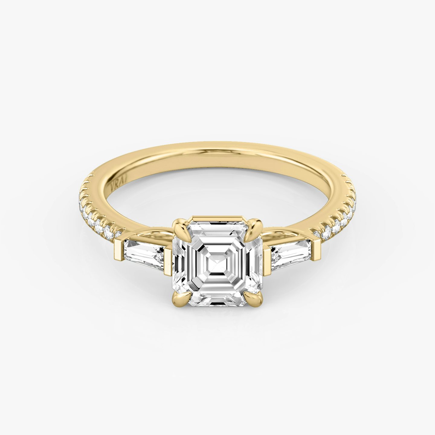 The Three Stone | Asscher | 18k | 18k Yellow Gold | Band: Pavé | Side stone carat: 1/10 | Side stone shape: Tapered Baguette | Diamond orientation: vertical | Carat weight: See full inventory