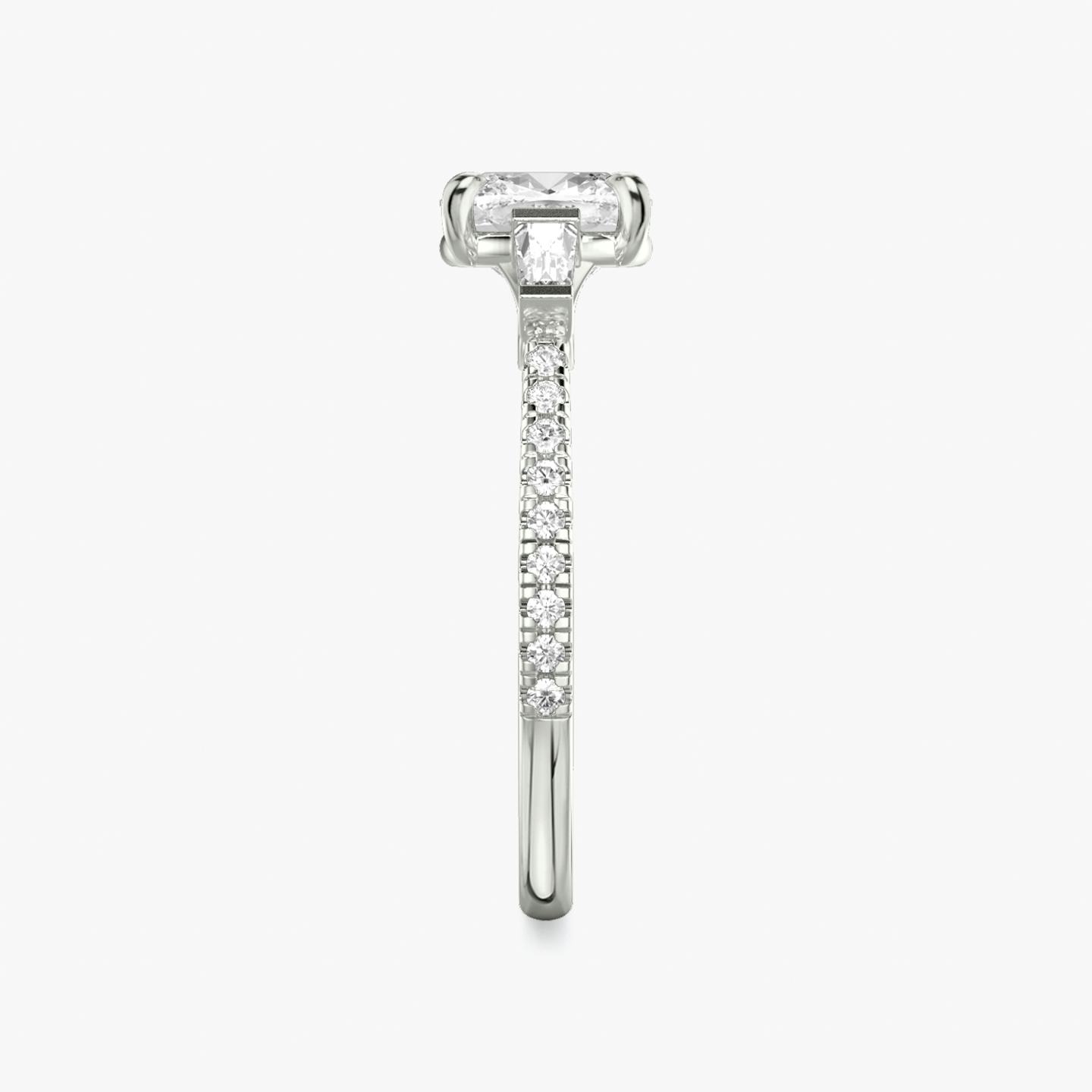 The Three Stone | Pavé Cushion | Platinum | Band: Pavé | Side stone carat: 1/10 | Side stone shape: Tapered Baguette | Diamond orientation: vertical | Carat weight: See full inventory
