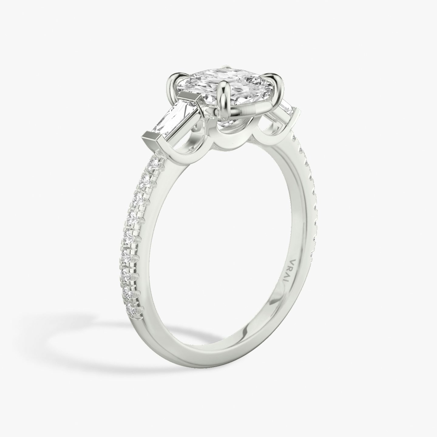 The Three Stone | Pavé Cushion | 18k | 18k White Gold | Band: Pavé | Side stone carat: 1/10 | Side stone shape: Tapered Baguette | Diamond orientation: vertical | Carat weight: See full inventory