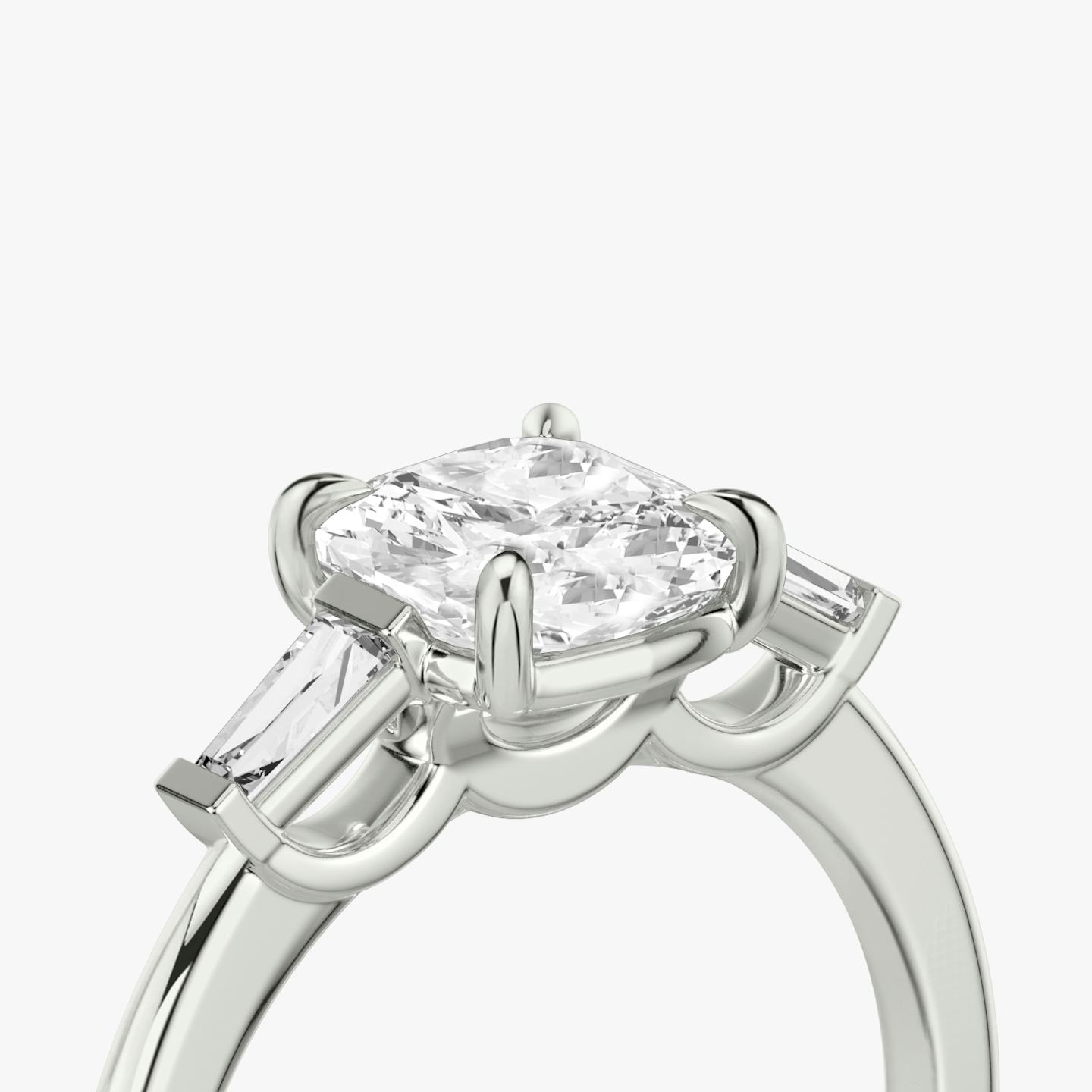 The Three Stone | Pavé Cushion | Platinum | Band: Plain | Side stone carat: 1/10 | Side stone shape: Tapered Baguette | Diamond orientation: vertical | Carat weight: See full inventory