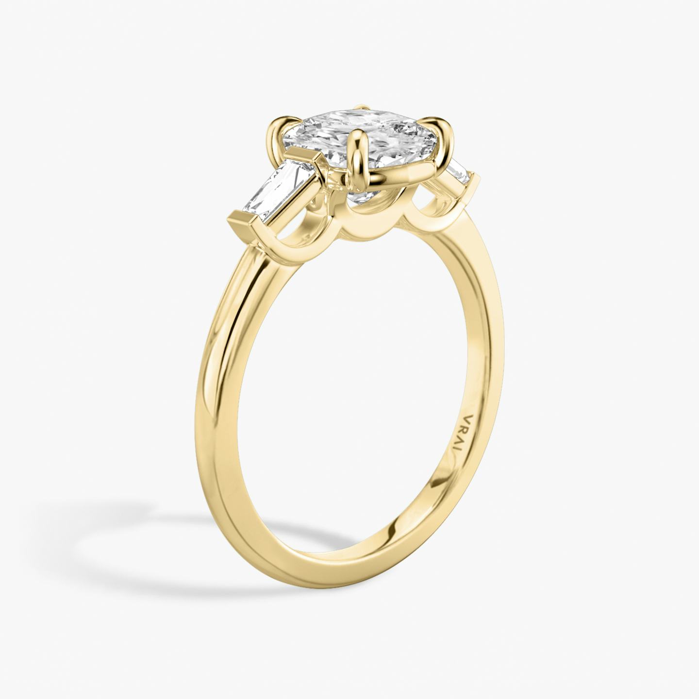 The Three Stone | Pavé Cushion | 18k | 18k Yellow Gold | Band: Plain | Side stone carat: 1/10 | Side stone shape: Tapered Baguette | Diamond orientation: vertical | Carat weight: See full inventory
