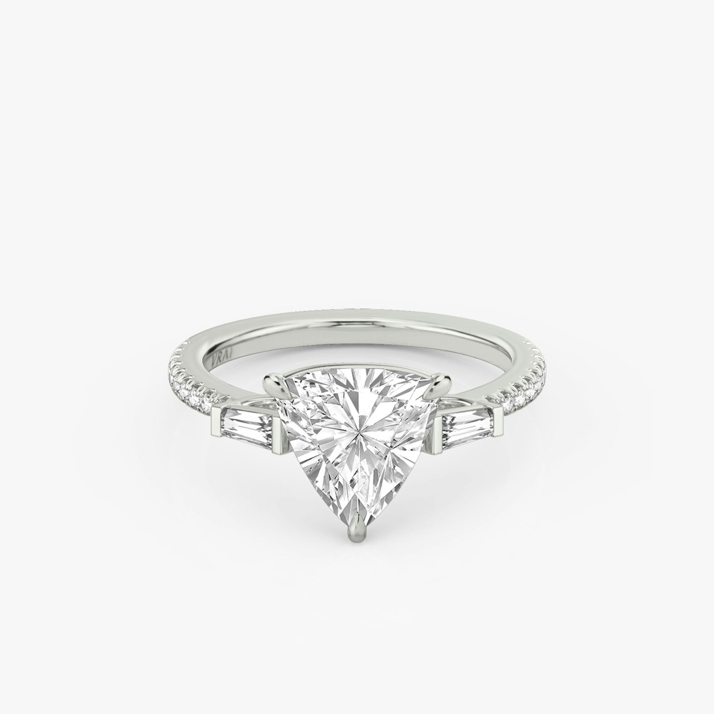 The Three Stone | Trillion | Platinum | Band: Pavé | Side stone carat: 1/10 | Side stone shape: Tapered Baguette | Diamond orientation: vertical | Carat weight: See full inventory