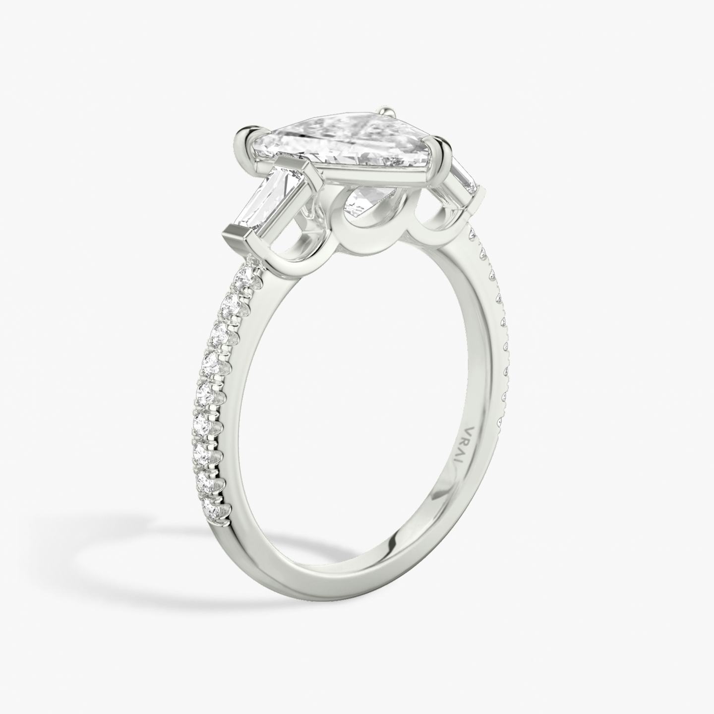 The Three Stone | Trillion | 18k | 18k White Gold | Band: Pavé | Side stone carat: 1/10 | Side stone shape: Tapered Baguette | Diamond orientation: vertical | Carat weight: See full inventory