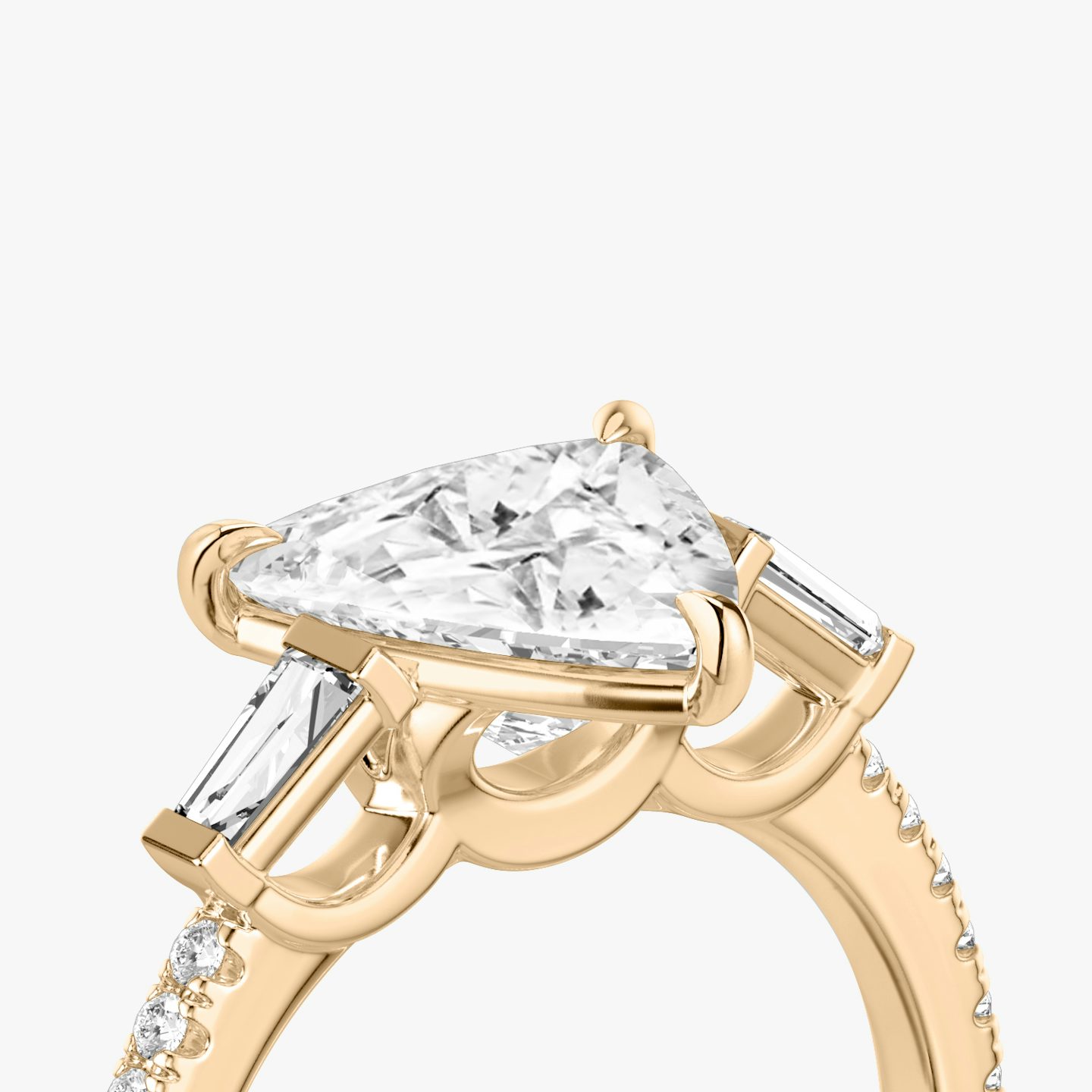 The Three Stone | Trillion | 14k | 14k Rose Gold | Band: Pavé | Side stone carat: 1/10 | Side stone shape: Tapered Baguette | Diamond orientation: vertical | Carat weight: See full inventory