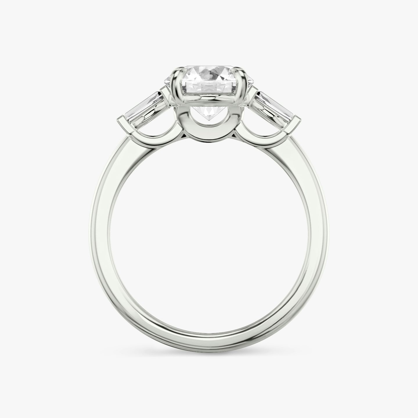 The Three Stone | Round Brilliant | 18k | 18k White Gold | Band: Plain | Carat weight: 1½ | Side stone carat: 1/10 | Side stone shape: Tapered Baguette | Diamond orientation: vertical