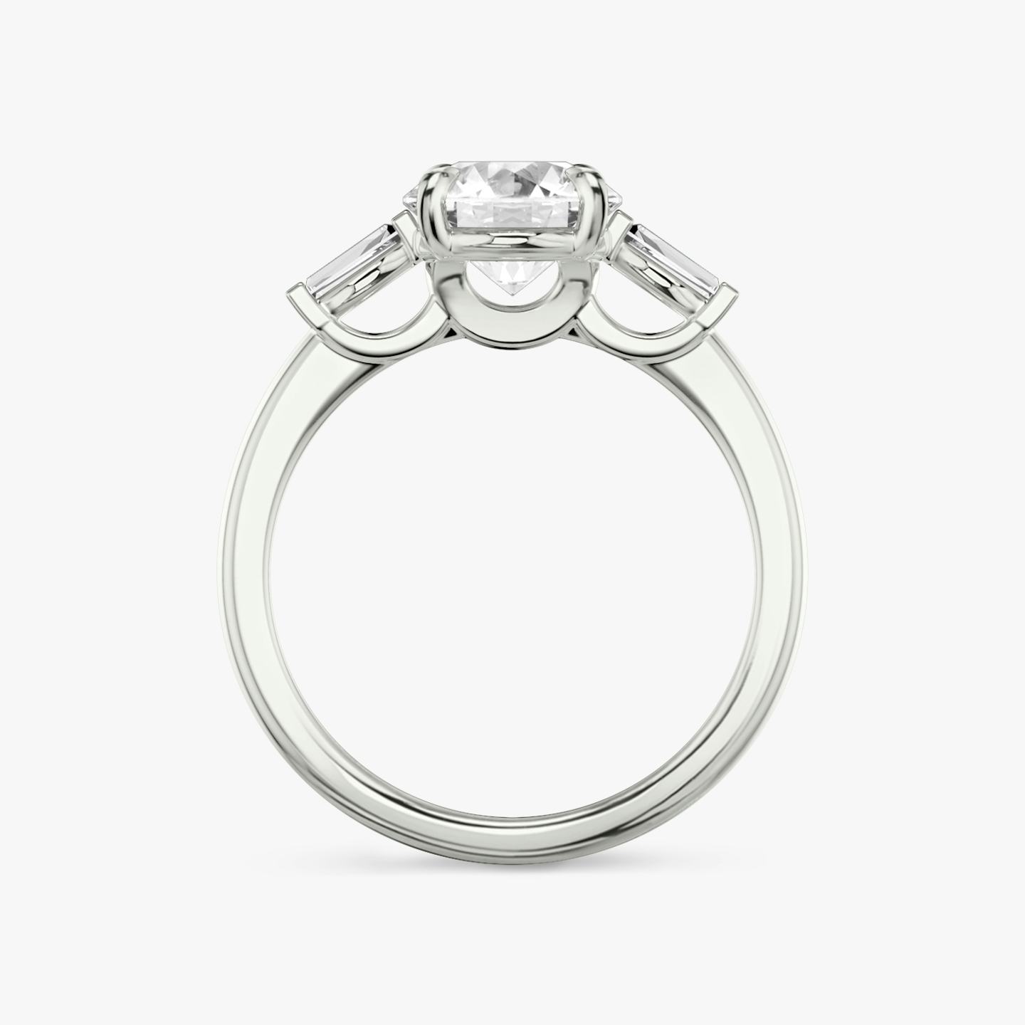 The Three Stone | Round Brilliant | Platinum | Band: Plain | Carat weight: See full inventory | Side stone carat: 1/10 | Side stone shape: Tapered Baguette | Diamond orientation: vertical