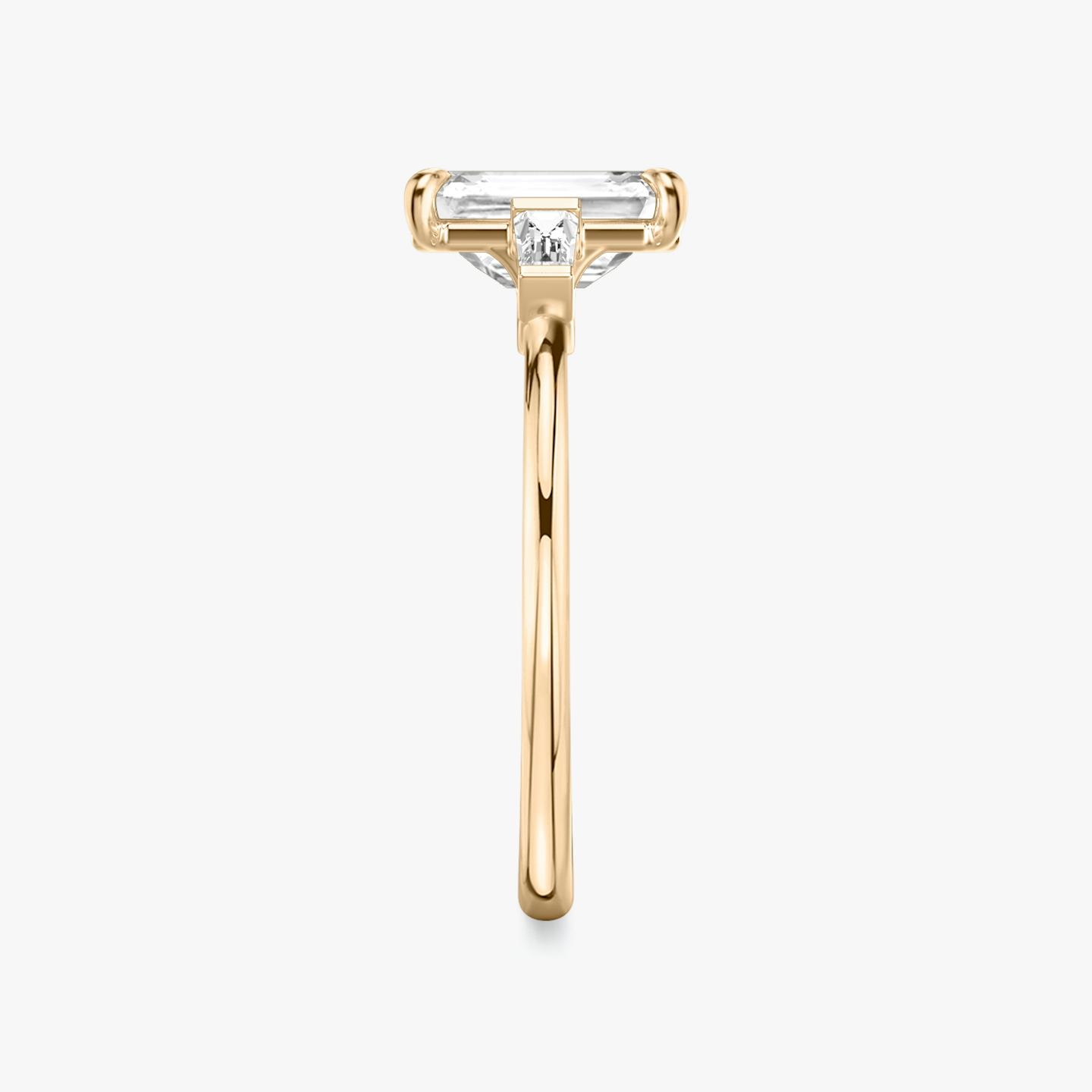 The Three Stone | Emerald | 14k | 14k Rose Gold | Band: Plain | Side stone carat: 1/10 | Side stone shape: Tapered Baguette | Diamond orientation: vertical | Carat weight: See full inventory
