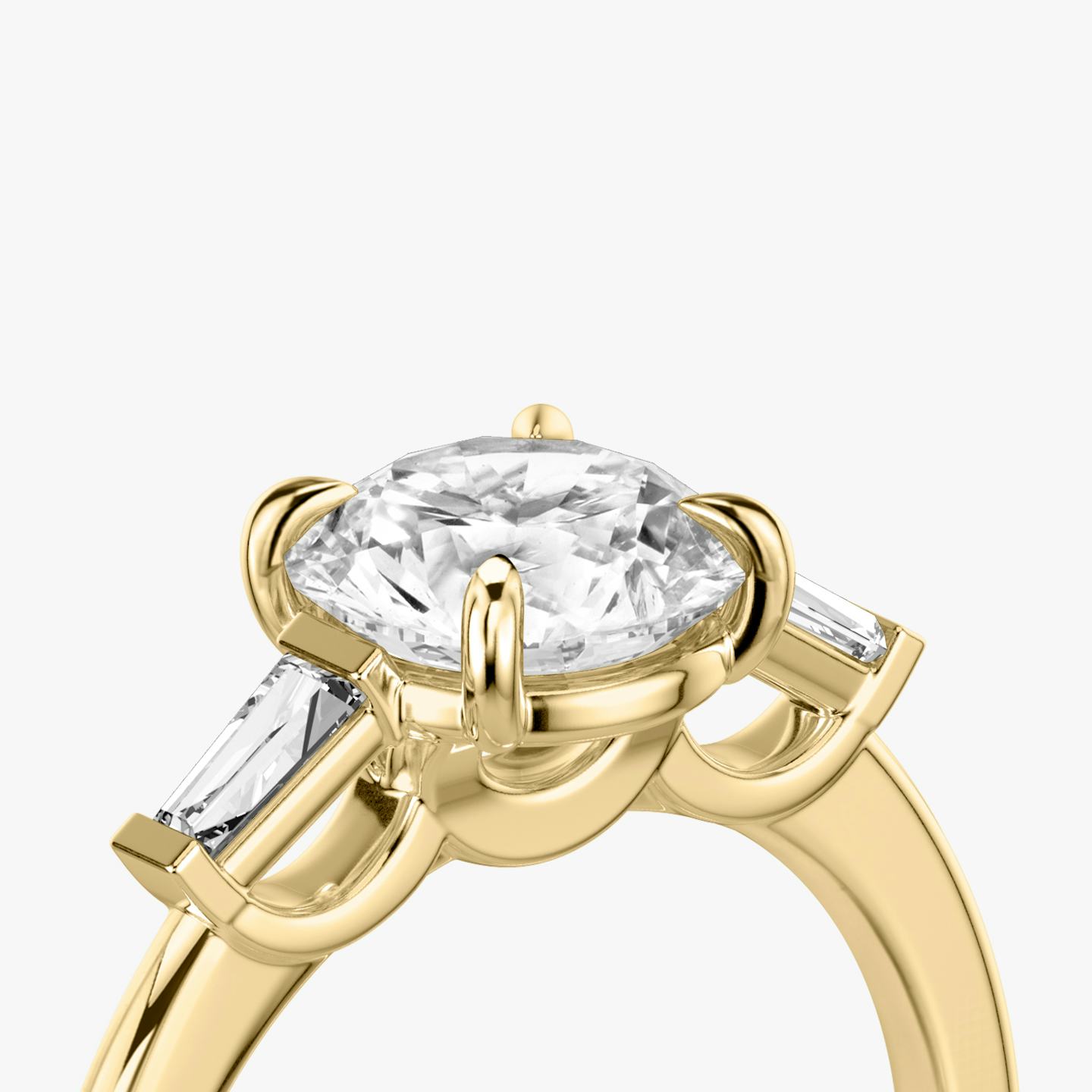 The Three Stone | Round Brilliant | 18k | 18k Yellow Gold | Band: Plain | Carat weight: 1 | Side stone carat: 1/10 | Side stone shape: Tapered Baguette | Diamond orientation: vertical