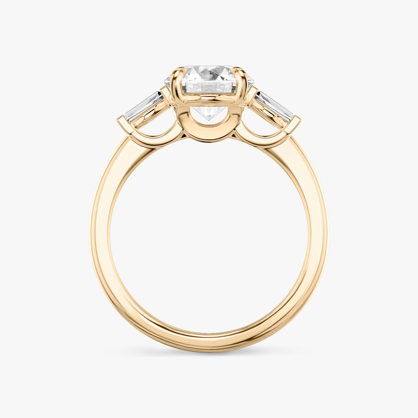 The Three Stone | Round Brilliant | 14k | 14k Rose Gold | Band: Plain | Carat weight: 1 | Side stone carat: 1/10 | Side stone shape: Tapered Baguette | Diamond orientation: vertical