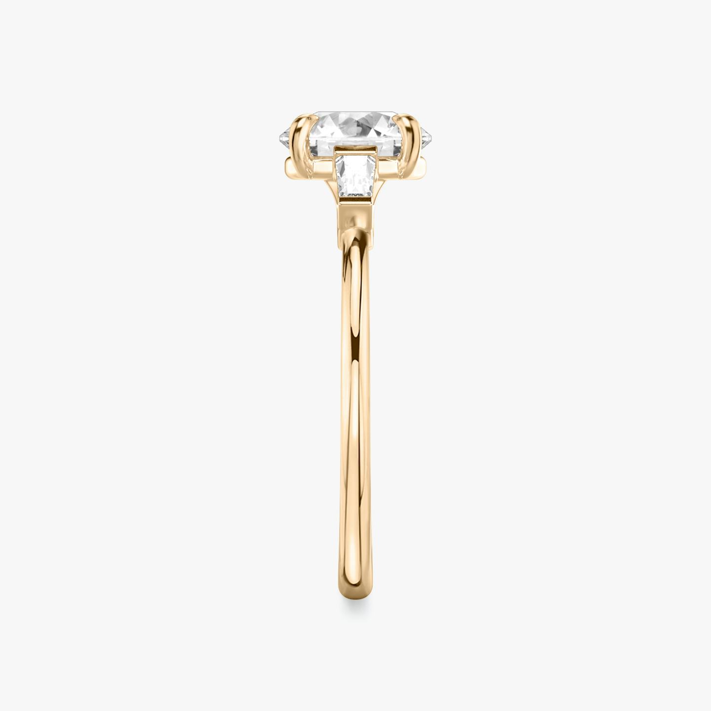 The Three Stone | Round Brilliant | 14k | 14k Rose Gold | Band: Plain | Carat weight: 1 | Side stone carat: 1/10 | Side stone shape: Tapered Baguette | Diamond orientation: vertical