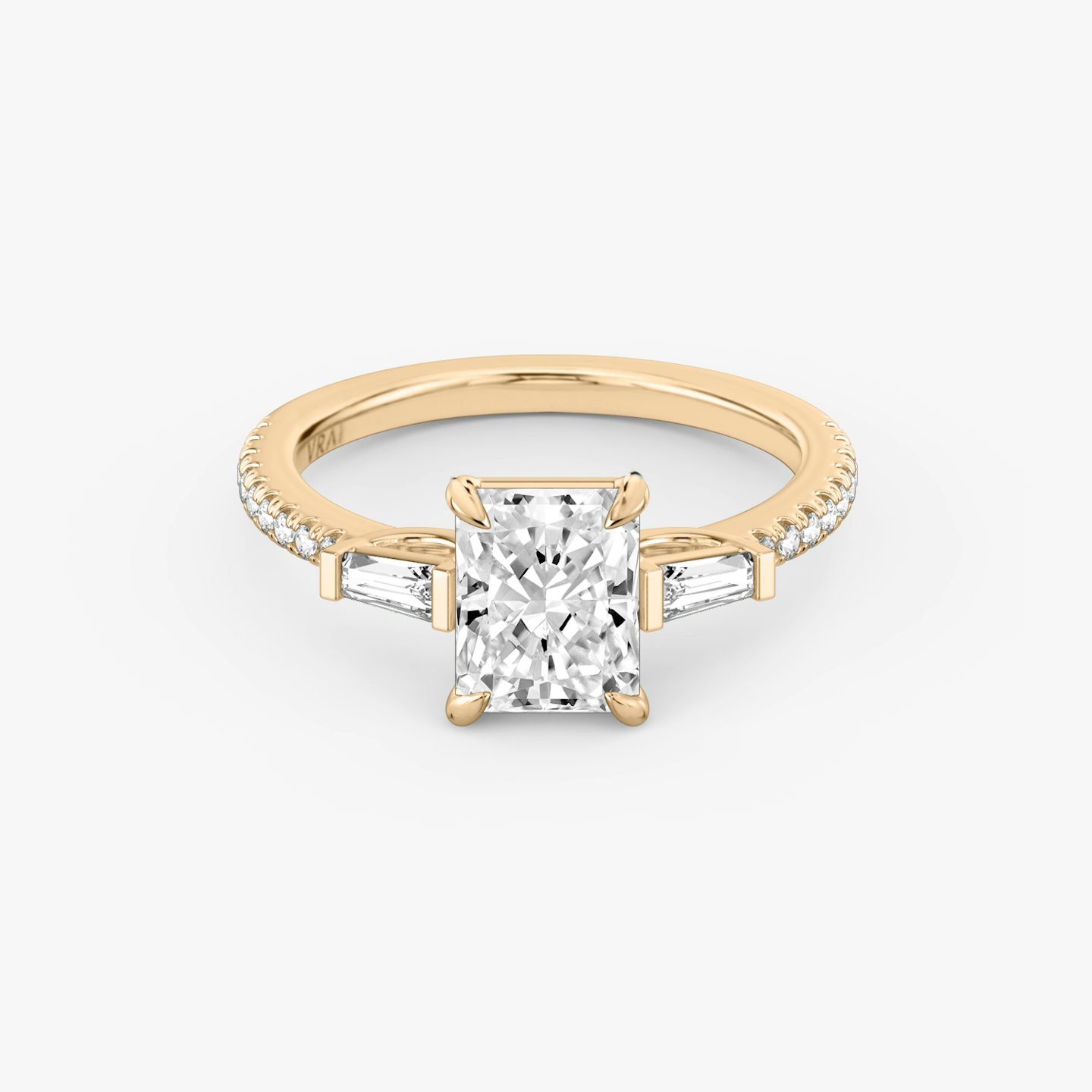 The Three Stone | Radiant | 14k | 14k Rose Gold | Band: Pavé | Side stone carat: 1/10 | Side stone shape: Tapered Baguette | Diamond orientation: vertical | Carat weight: See full inventory