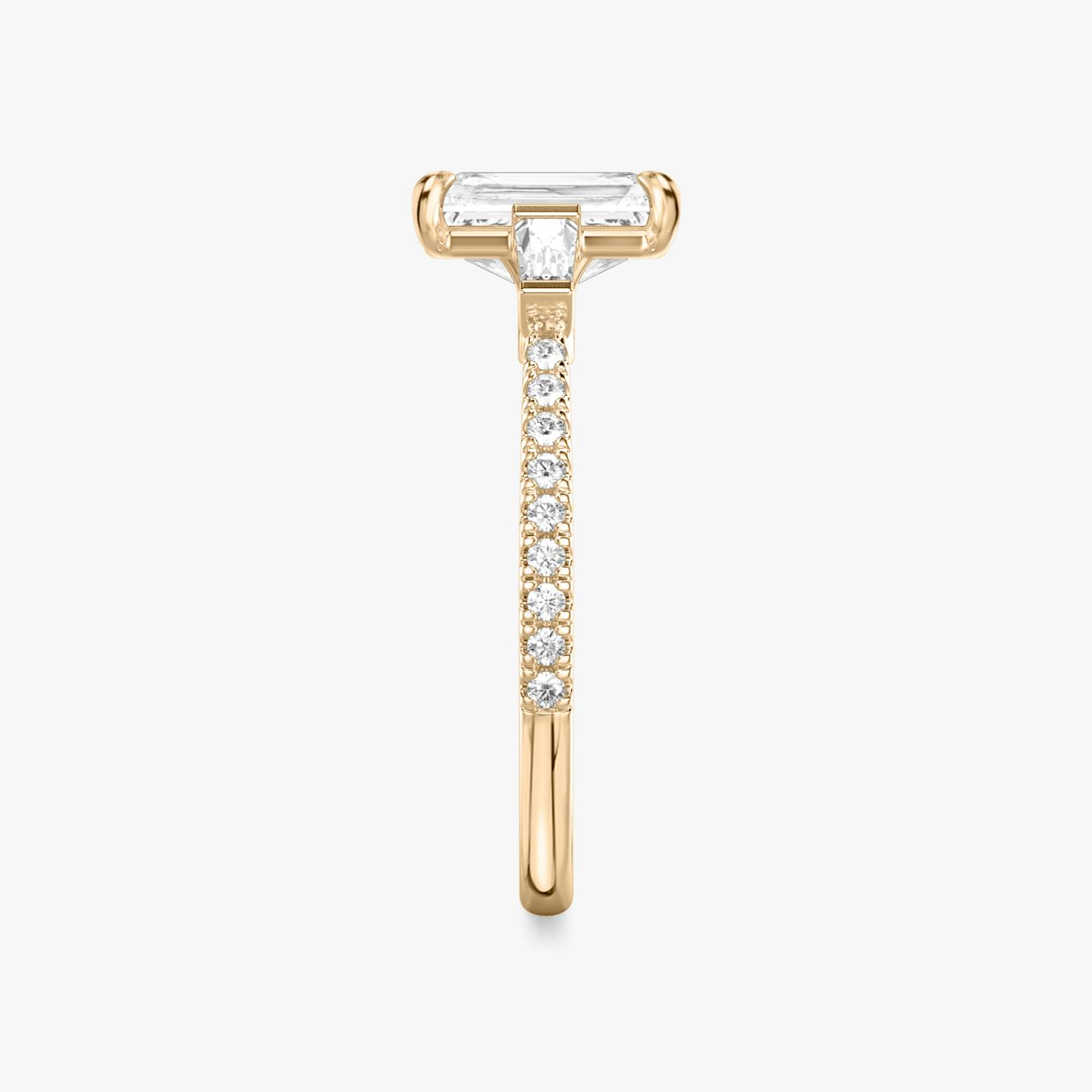 The Three Stone | Radiant | 14k | 14k Rose Gold | Band: Pavé | Side stone carat: 1/10 | Side stone shape: Tapered Baguette | Diamond orientation: vertical | Carat weight: See full inventory