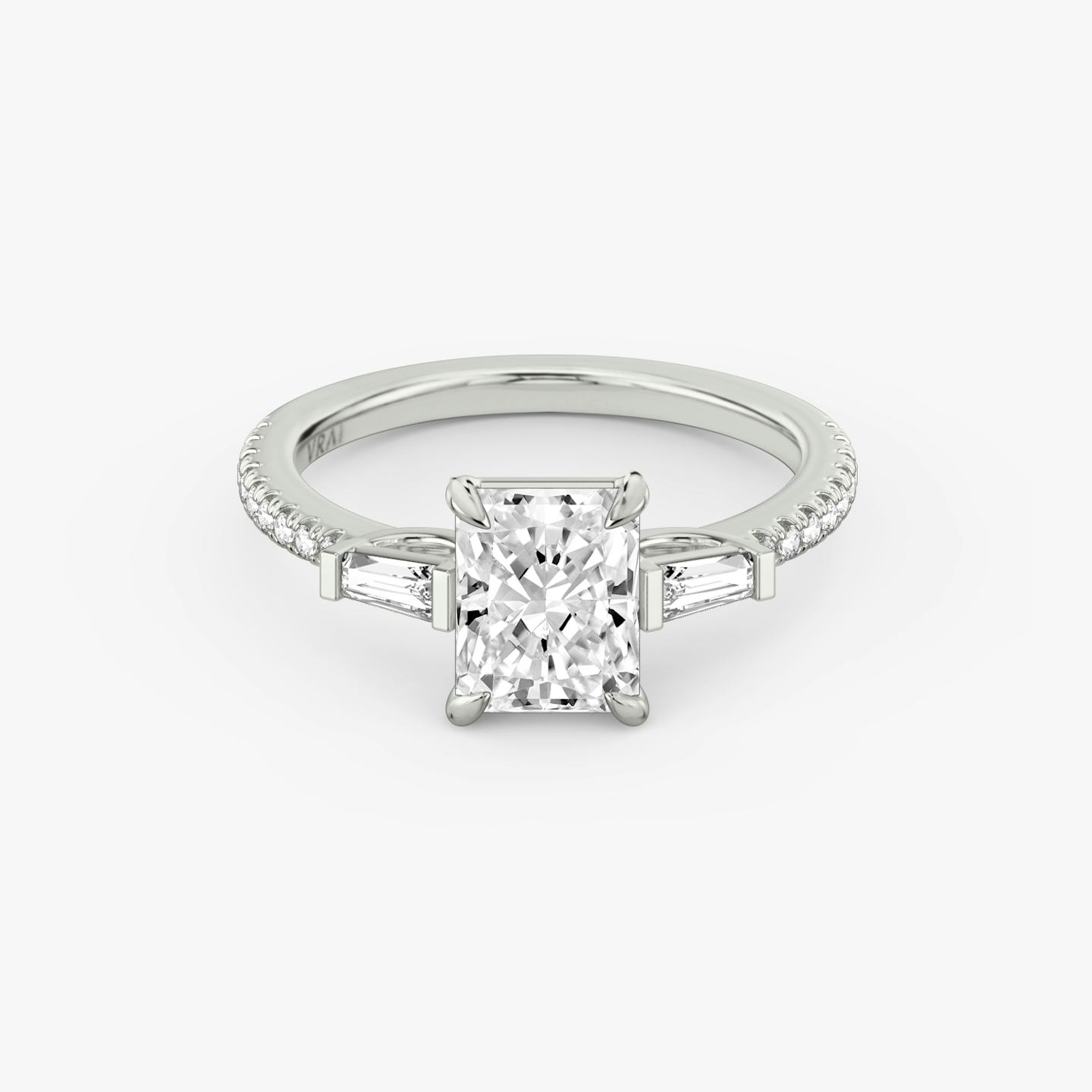 The Three Stone | Radiant | 18k | 18k White Gold | Band: Pavé | Side stone carat: 1/10 | Side stone shape: Tapered Baguette | Diamond orientation: vertical | Carat weight: See full inventory