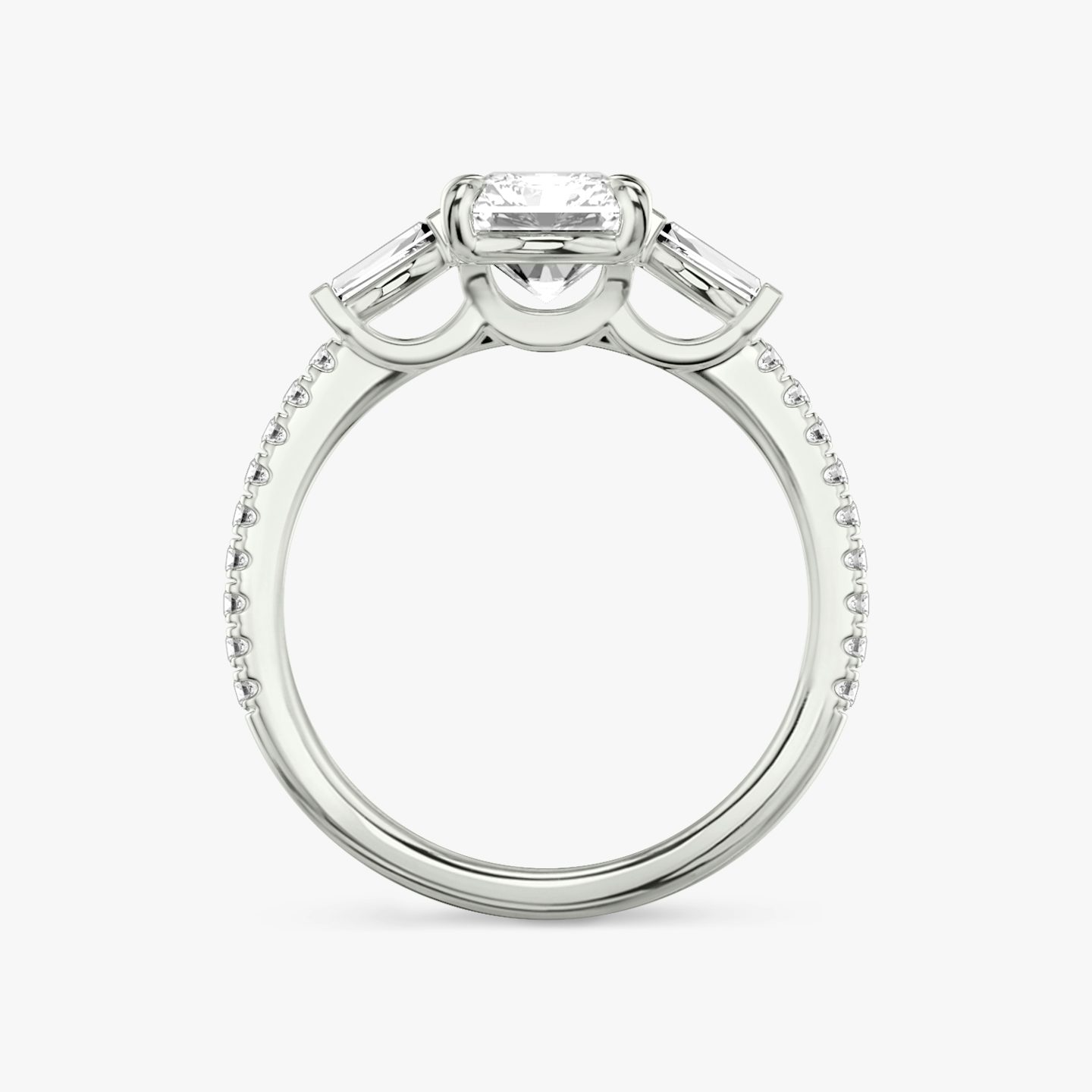 The Three Stone | Radiant | 18k | 18k White Gold | Band: Pavé | Side stone carat: 1/10 | Side stone shape: Tapered Baguette | Diamond orientation: vertical | Carat weight: See full inventory