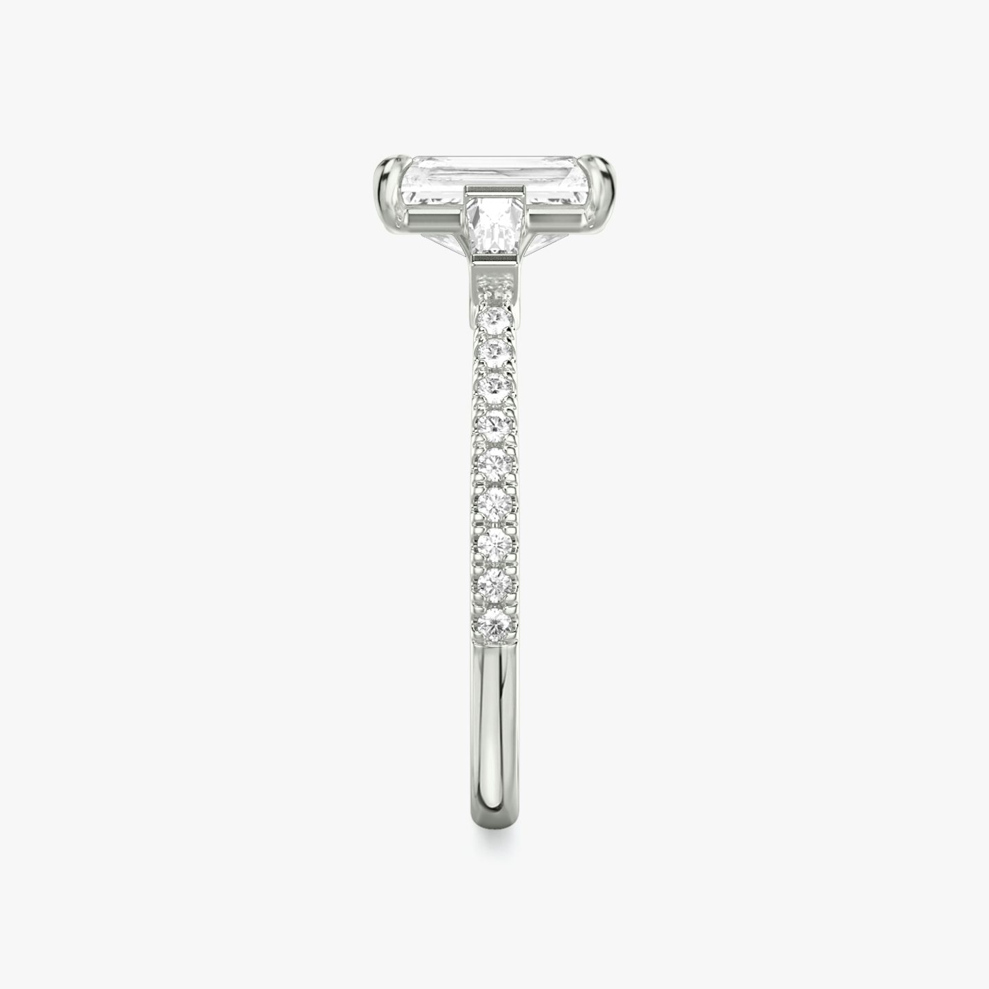 The Three Stone | Radiant | Platinum | Band: Pavé | Side stone carat: 1/10 | Side stone shape: Tapered Baguette | Diamond orientation: vertical | Carat weight: See full inventory