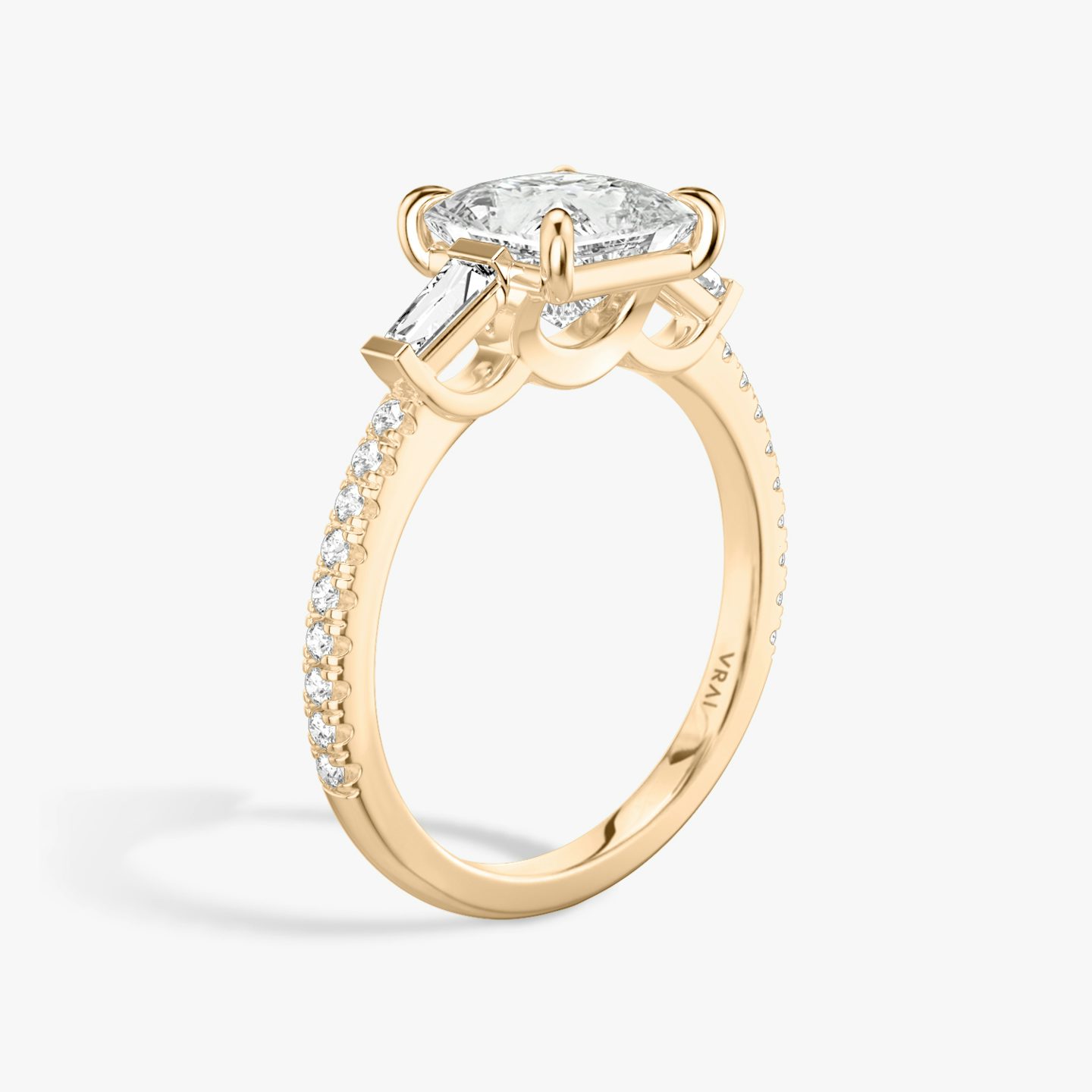 The Three Stone | Princess | 14k | 14k Rose Gold | Band: Pavé | Side stone carat: 1/10 | Side stone shape: Tapered Baguette | Diamond orientation: vertical | Carat weight: See full inventory