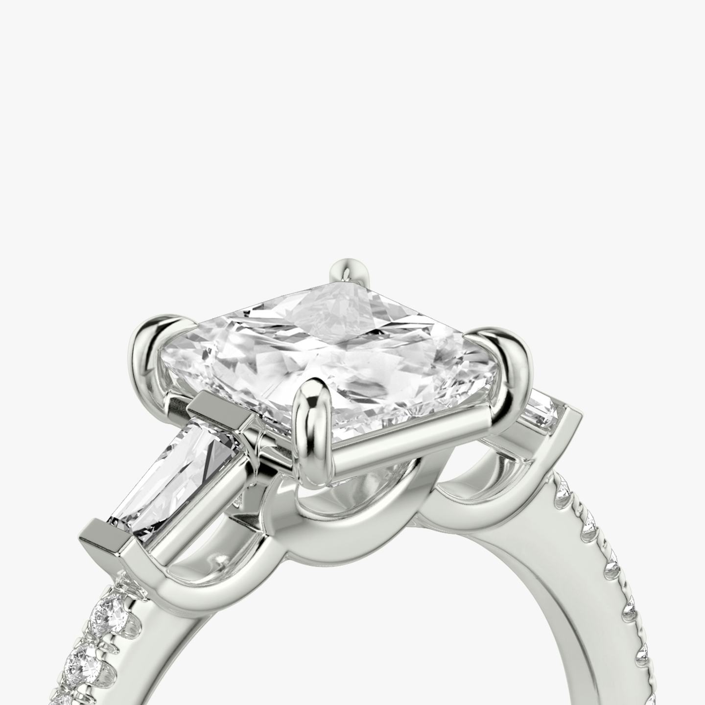 The Three Stone | Princess | Platinum | Band: Pavé | Side stone carat: 1/10 | Side stone shape: Tapered Baguette | Diamond orientation: vertical | Carat weight: See full inventory