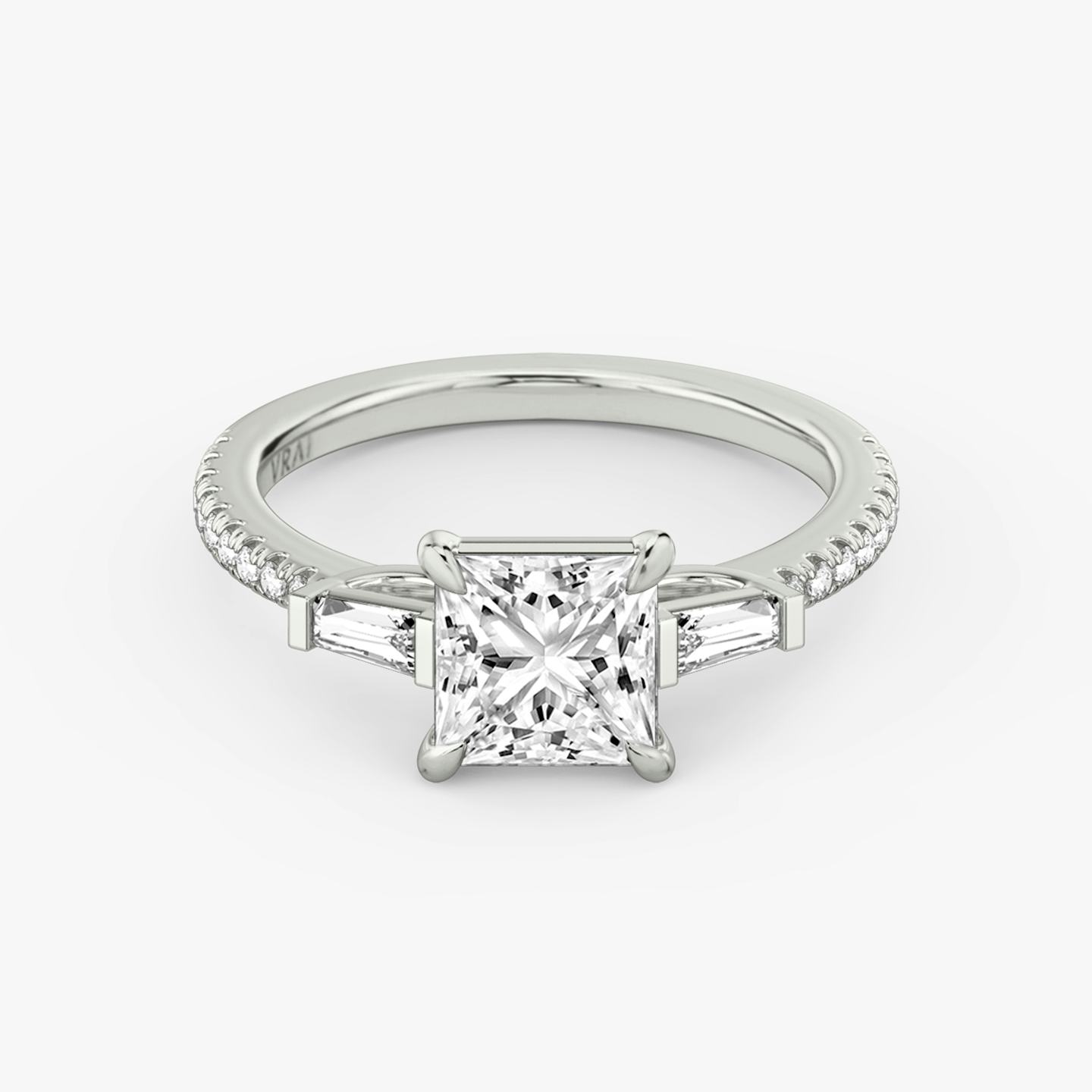 The Three Stone | Princess | Platinum | Band: Pavé | Side stone carat: 1/10 | Side stone shape: Tapered Baguette | Diamond orientation: vertical | Carat weight: See full inventory