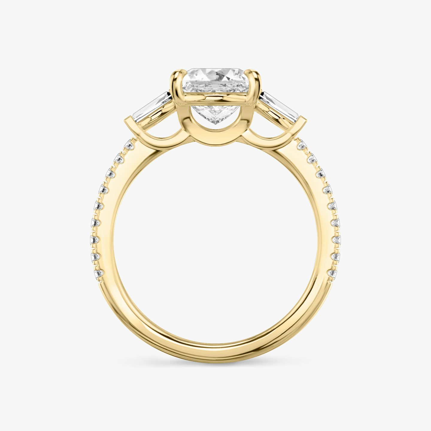 The Three Stone | Princess | 18k | 18k Yellow Gold | Band: Pavé | Side stone carat: 1/10 | Side stone shape: Tapered Baguette | Diamond orientation: vertical | Carat weight: See full inventory