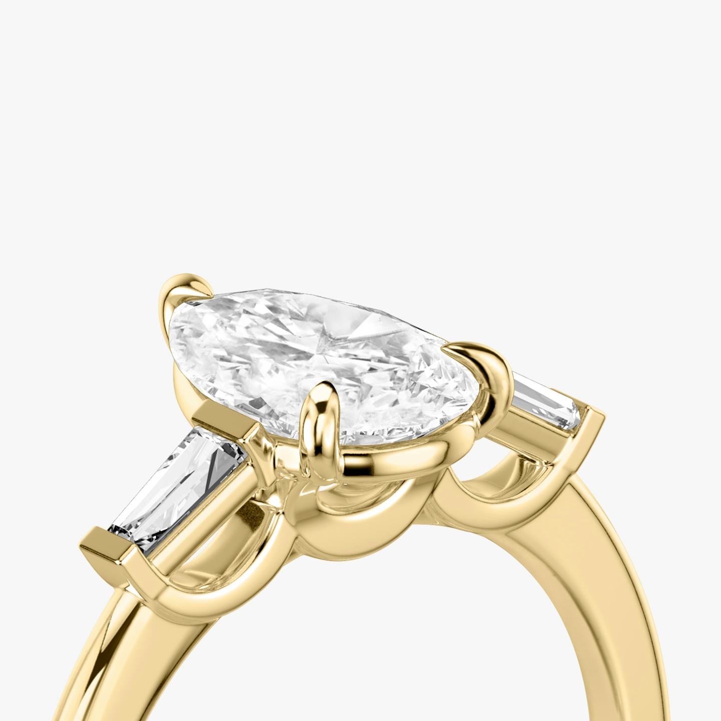 The Three Stone | Pear | 18k | 18k Yellow Gold | Band: Plain | Side stone carat: 1/10 | Side stone shape: Tapered Baguette | Diamond orientation: vertical | Carat weight: See full inventory