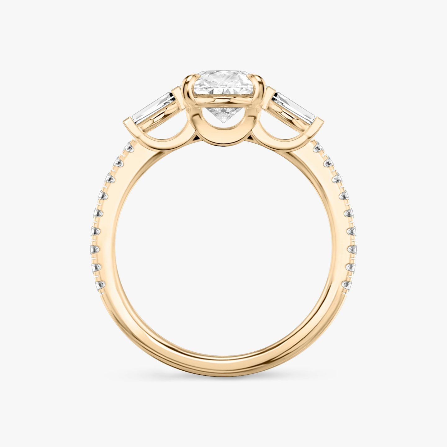 The Three Stone | Pear | 14k | 14k Rose Gold | Band: Pavé | Side stone carat: 1/10 | Side stone shape: Tapered Baguette | Diamond orientation: vertical | Carat weight: See full inventory