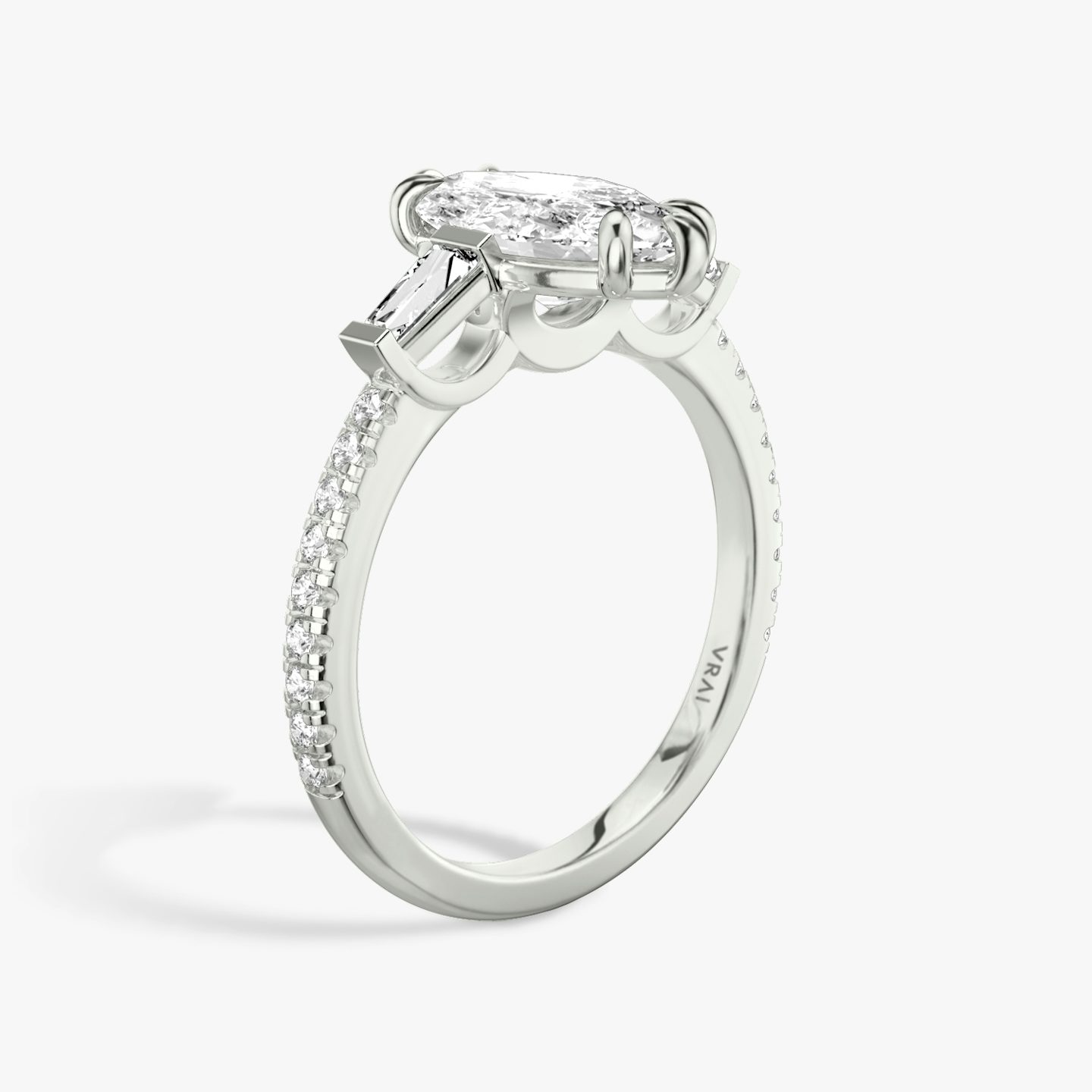 The Three Stone | Pavé Marquise | 18k | 18k White Gold | Band: Pavé | Side stone carat: 1/10 | Side stone shape: Tapered Baguette | Diamond orientation: vertical | Carat weight: See full inventory
