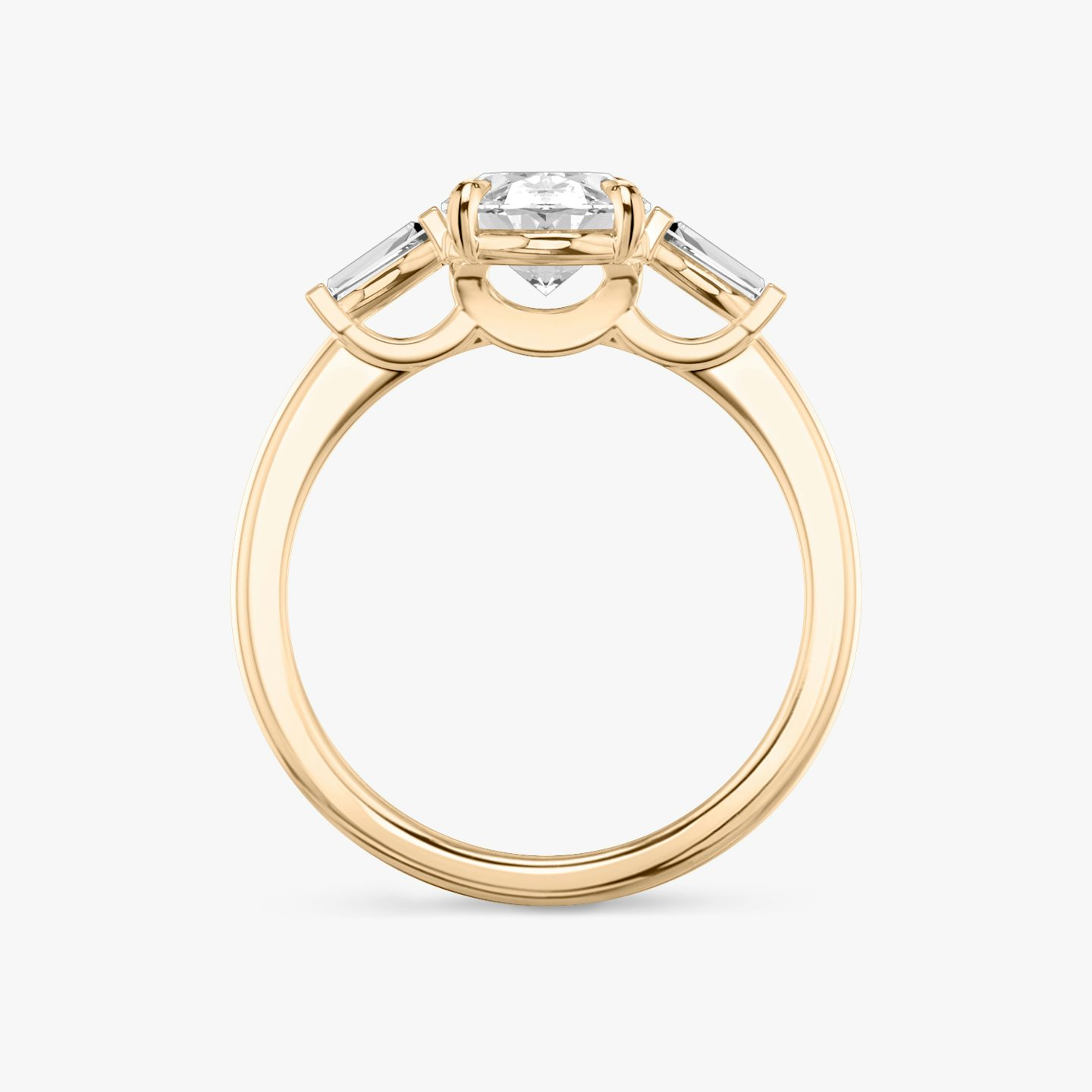 The Three Stone | Oval | 14k | 14k Rose Gold | Band: Plain | Side stone carat: 1/10 | Side stone shape: Tapered Baguette | Diamond orientation: vertical | Carat weight: See full inventory