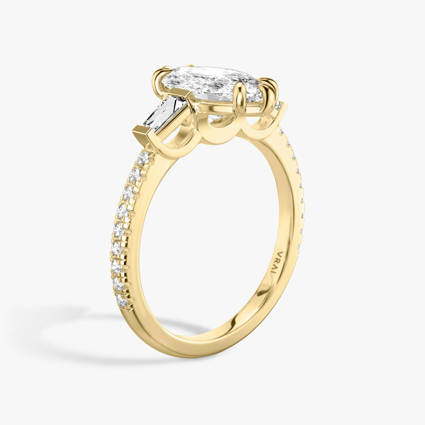 The Three Stone | Pavé Marquise | 18k | 18k Yellow Gold | Band: Pavé | Side stone carat: 1/10 | Side stone shape: Tapered Baguette | Diamond orientation: vertical | Carat weight: See full inventory