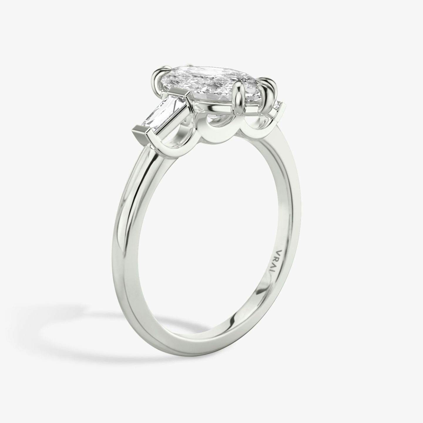 The Three Stone | Pavé Marquise | 18k | 18k White Gold | Band: Plain | Side stone carat: 1/10 | Side stone shape: Tapered Baguette | Diamond orientation: vertical | Carat weight: See full inventory