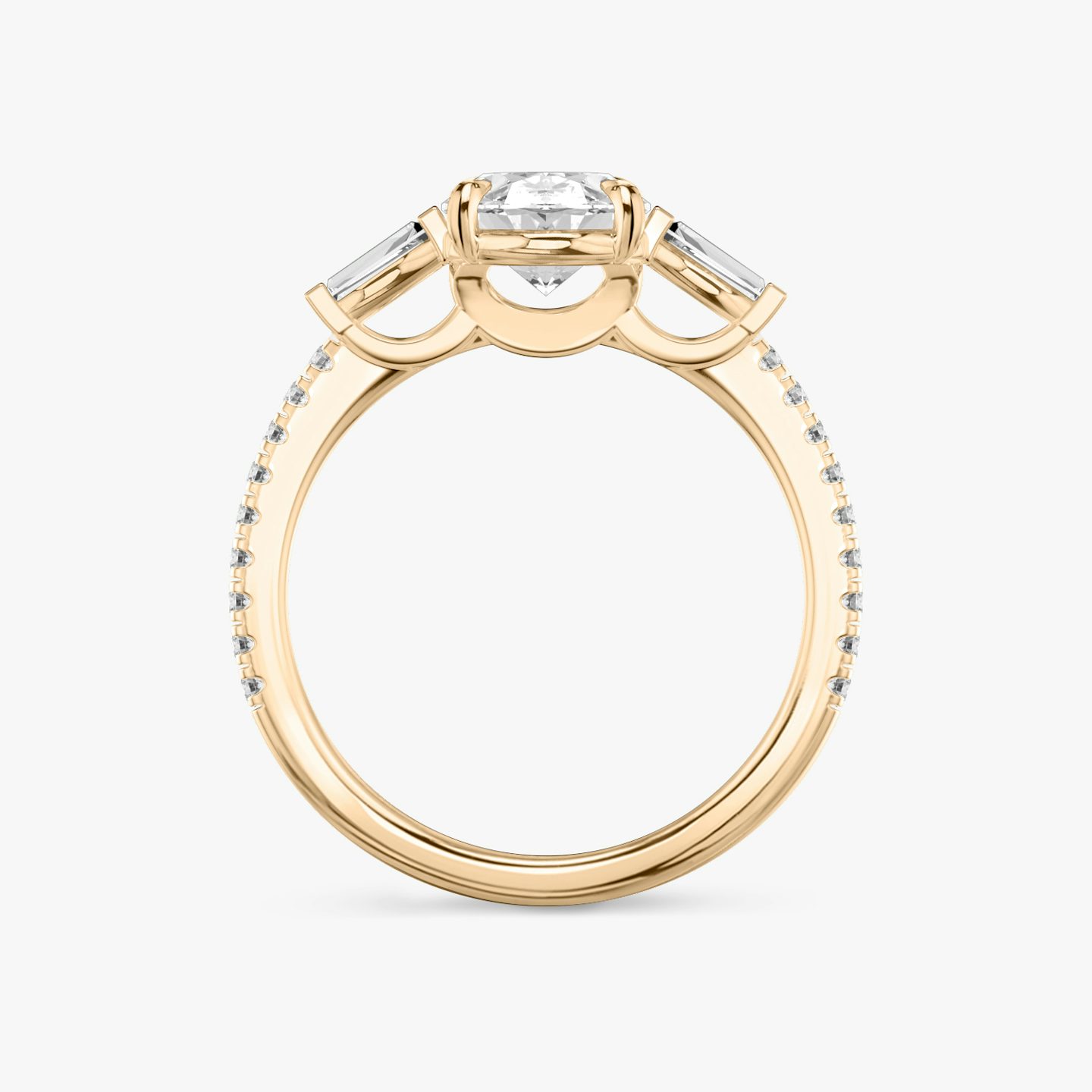 The Three Stone | Oval | 14k | 14k Rose Gold | Band: Pavé | Side stone carat: 1/10 | Side stone shape: Tapered Baguette | Diamond orientation: vertical | Carat weight: See full inventory