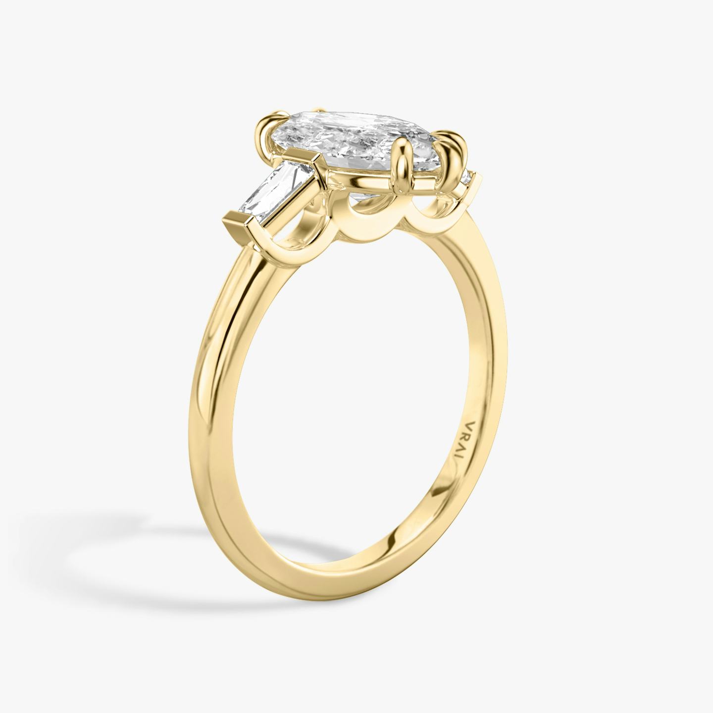 The Three Stone | Pavé Marquise | 18k | 18k Yellow Gold | Band: Plain | Side stone carat: 1/10 | Side stone shape: Tapered Baguette | Diamond orientation: vertical | Carat weight: See full inventory