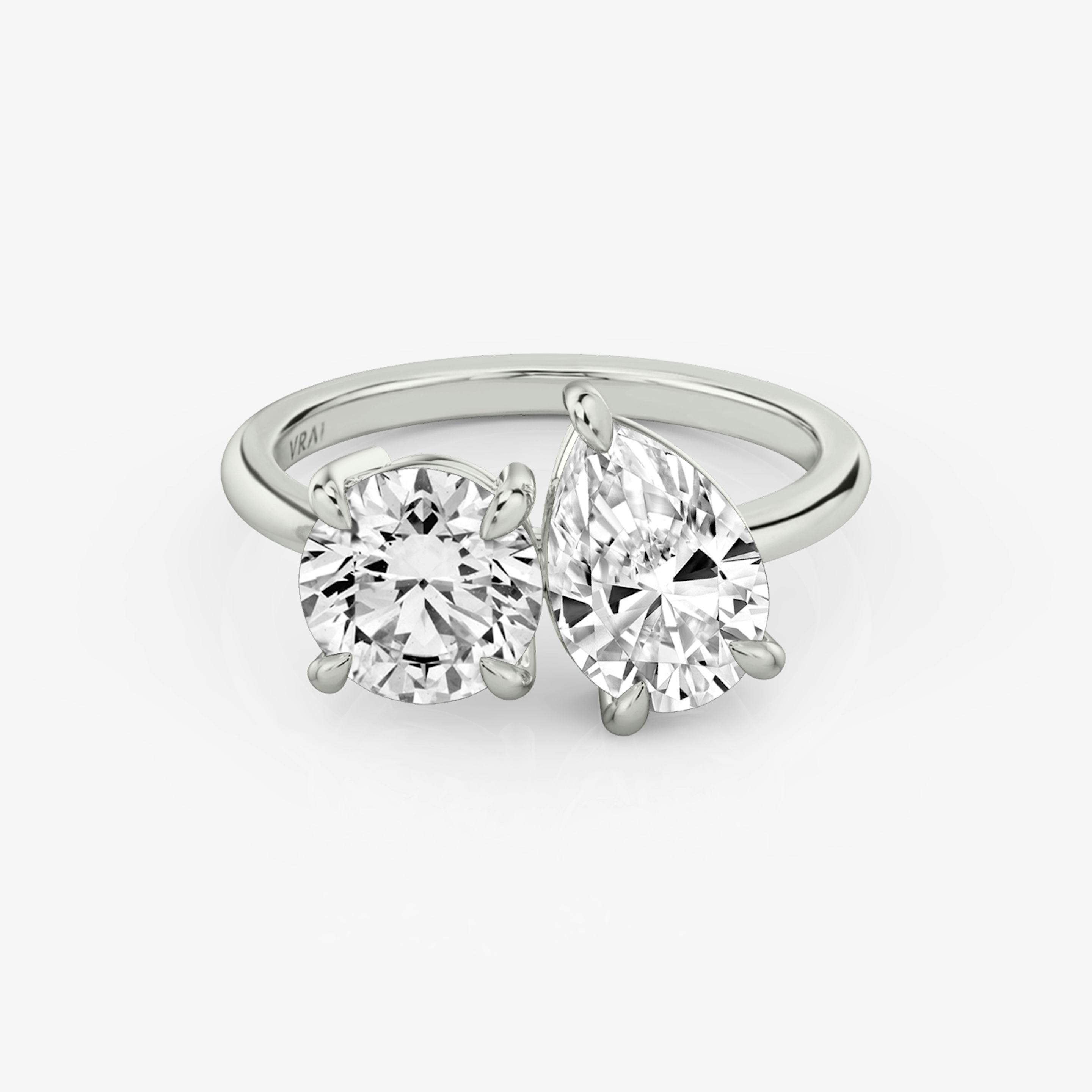 The Toi et Moi | Round Brilliant and Pear | Platinum | Band: Plain | Diamond orientation: vertical | Carat weight: See full inventory