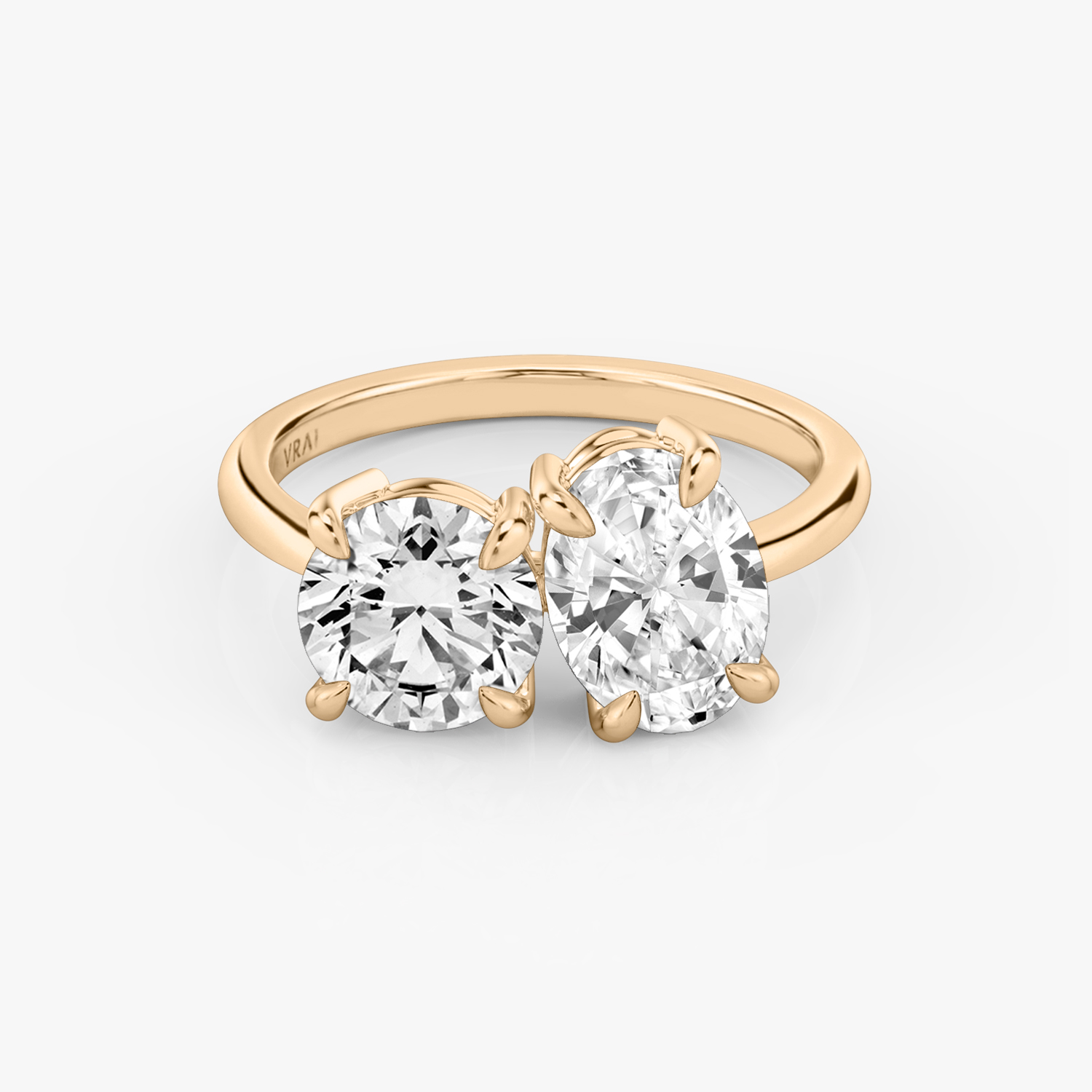 The Toi et Moi Round Brilliant and Oval Engagement Ring