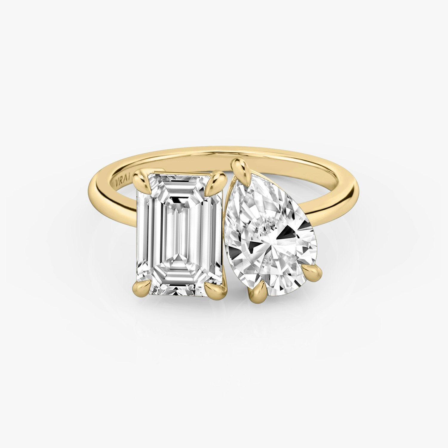 The Toi et Moi Emerald and Pear Engagement Ring | 18k Yellow Gold