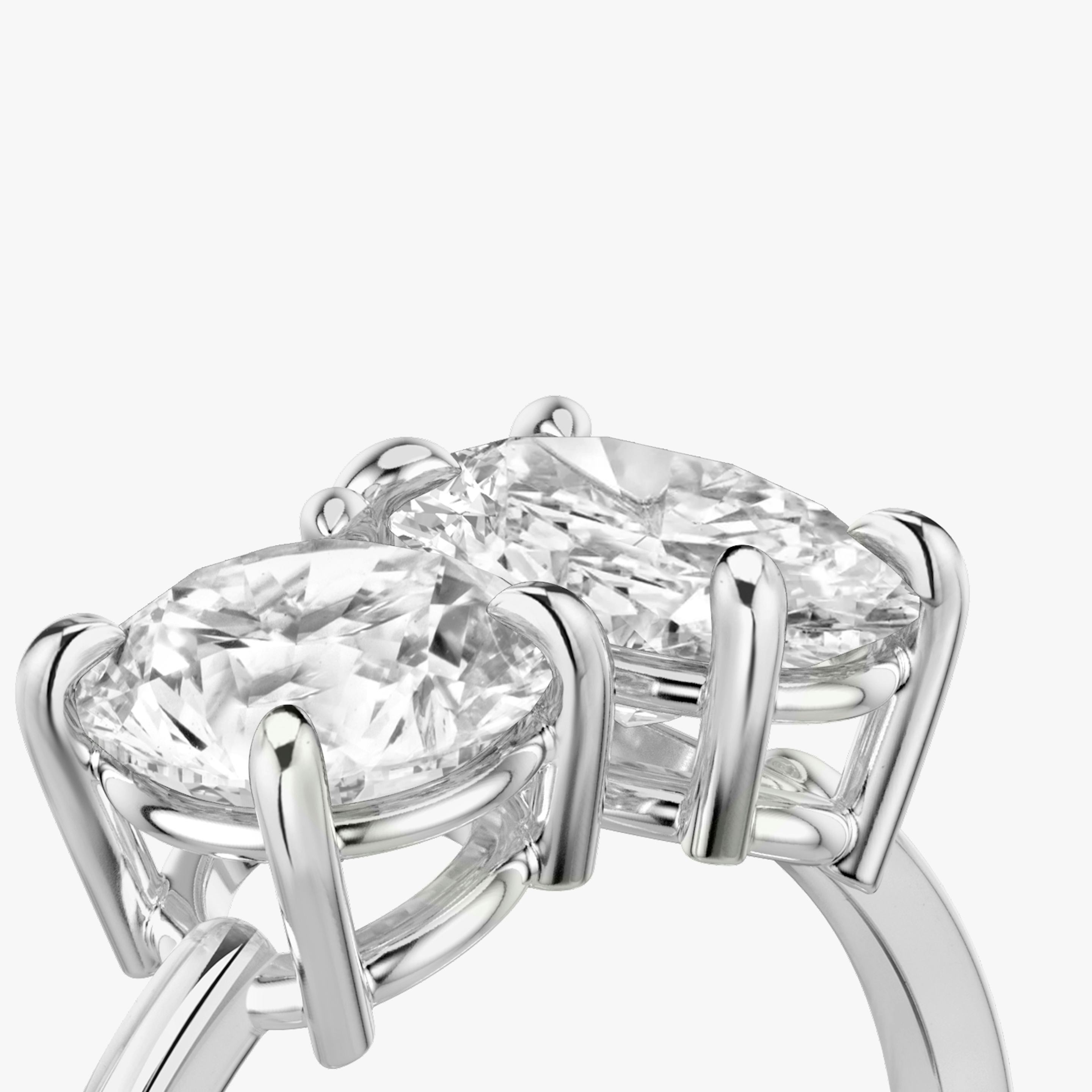 The Toi et Moi | Round Brilliant and Oval | Platinum | Band: Plain | Diamond orientation: vertical | Carat weight: See full inventory